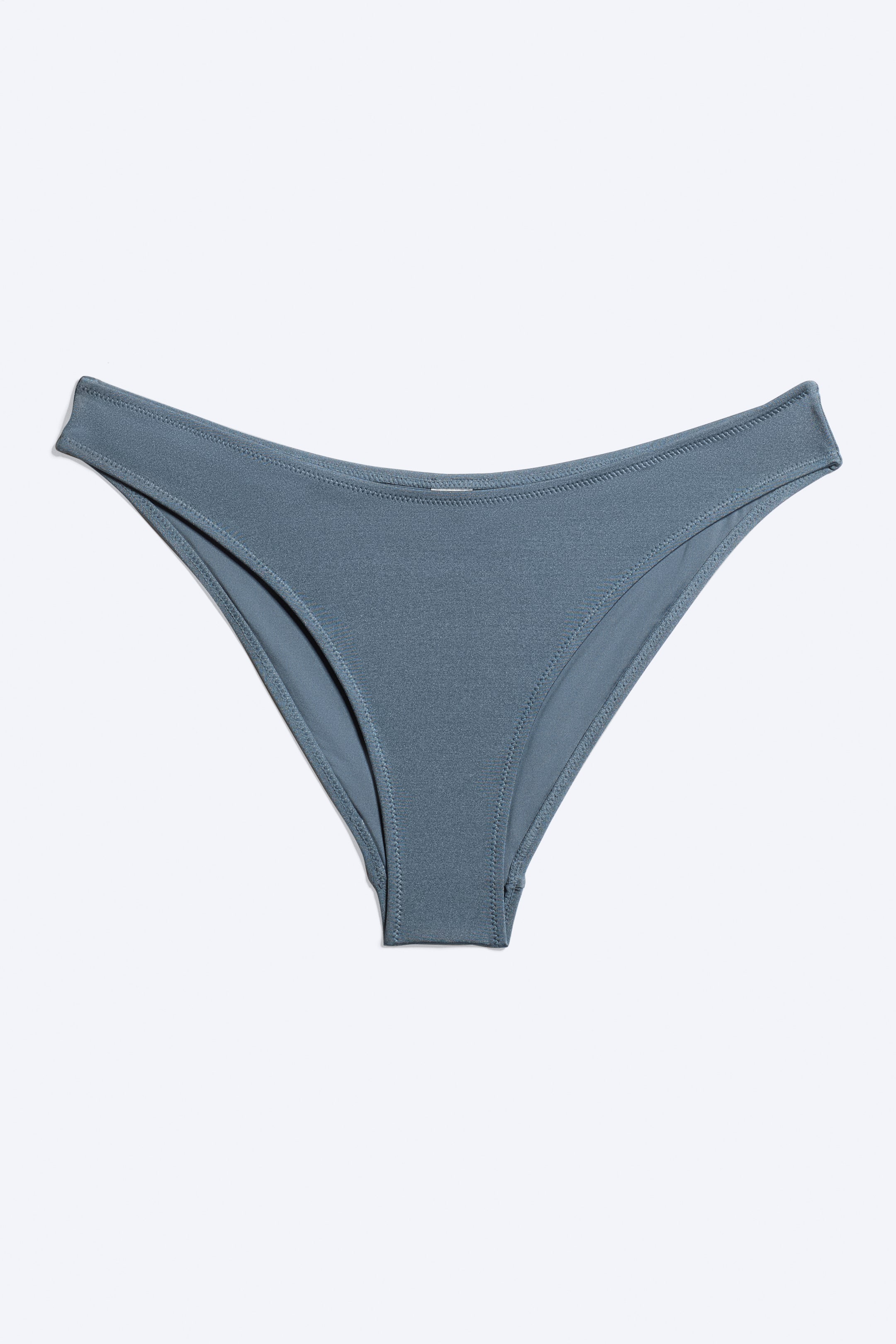 View larger image: A pair of bikini bottoms is being displayed front-facing in a slate blue colour. They feature a high-cut leg and a slightly scooped waistline.