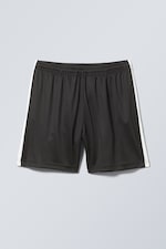Schwarz - Weit geschnittene Shorts im Colorblock-Design - 0