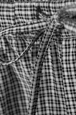 Zwart en wit geruit - Ruimvallende katoenen geruite broek - 1