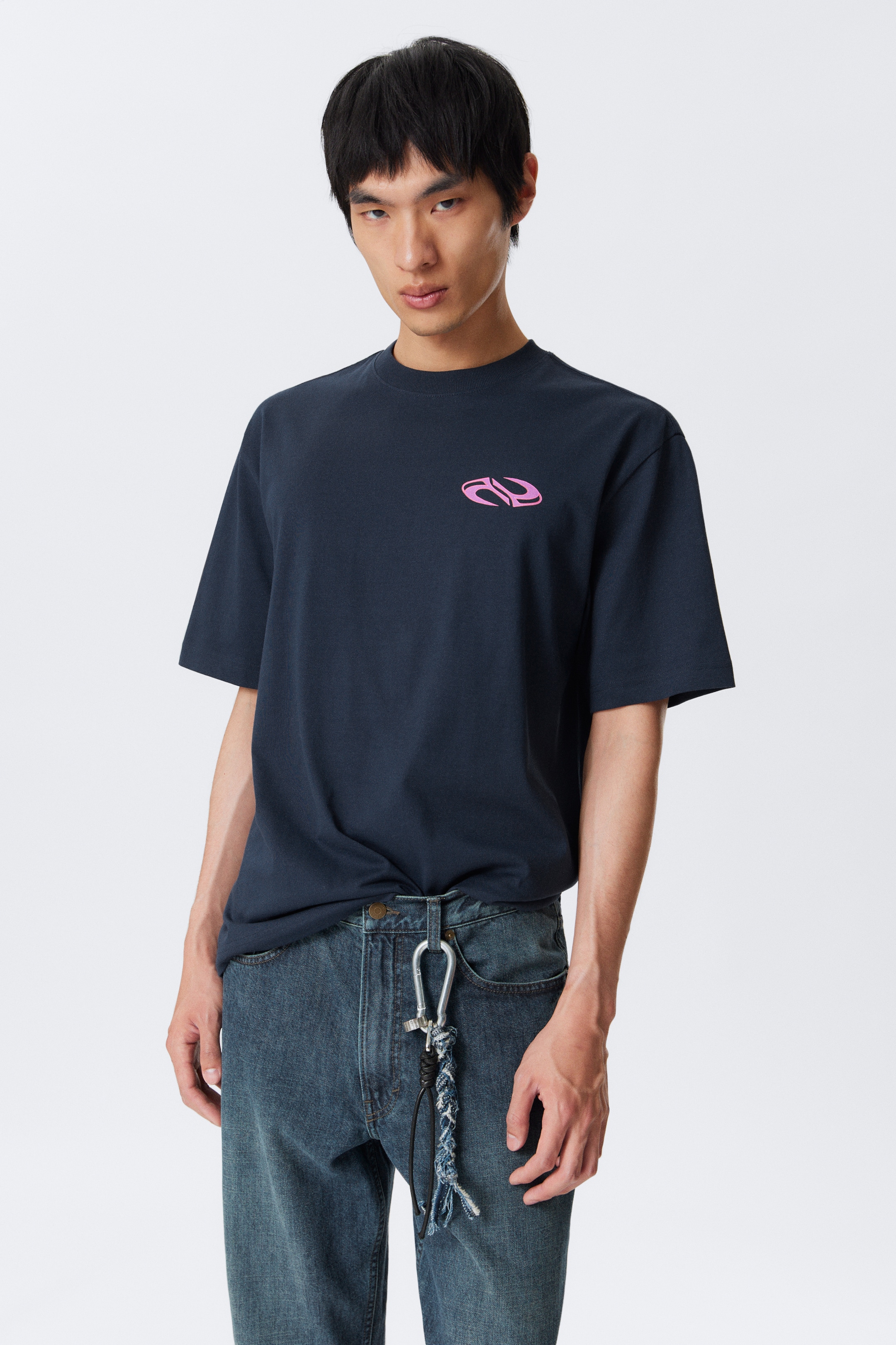 Visualizza immagine più grande: T-shirt con stampa grafica e vestibilità relaxed - Blu scuro - Double Wave - UOMO | H&M IT 1