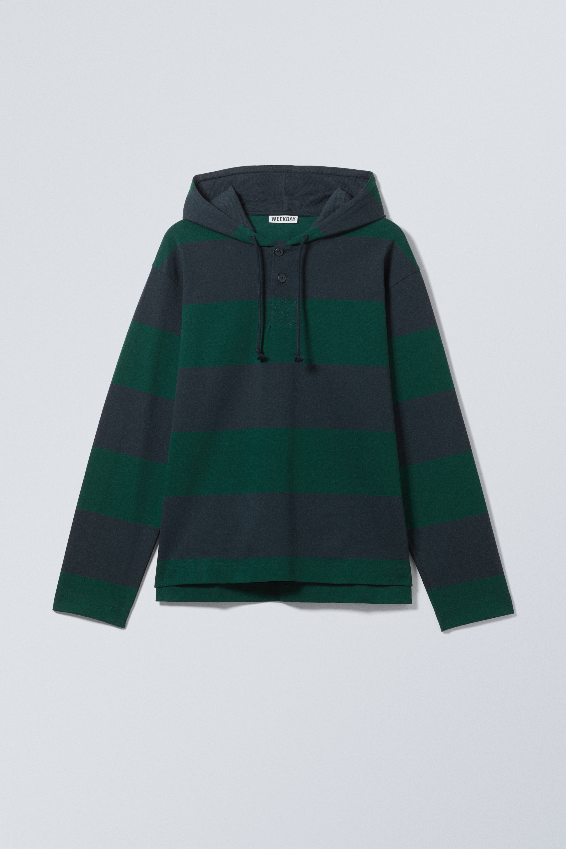 Visualizza immagine più grande: Felpa da rugby loose a righe con cappuccio - Righe blu scuro e verde scuro - UOMO | H&M IT 1