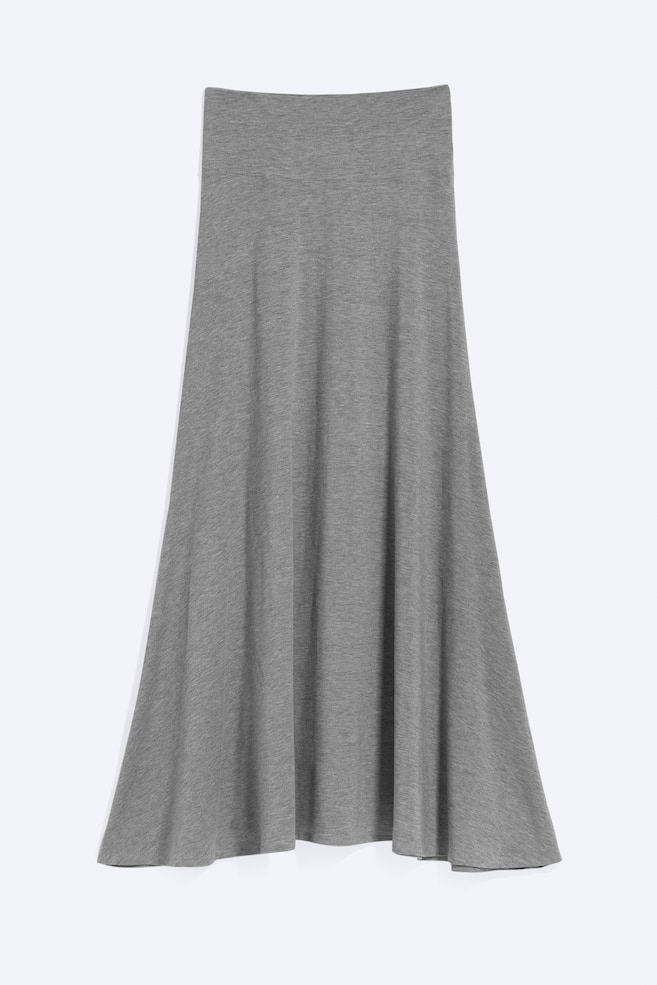 A grey maxi skirt is presented facing front, featuring a smooth, blended fabric. It showcases a wide, elasticated waistband and a regular fit that subtly flares at the bottom. - 1