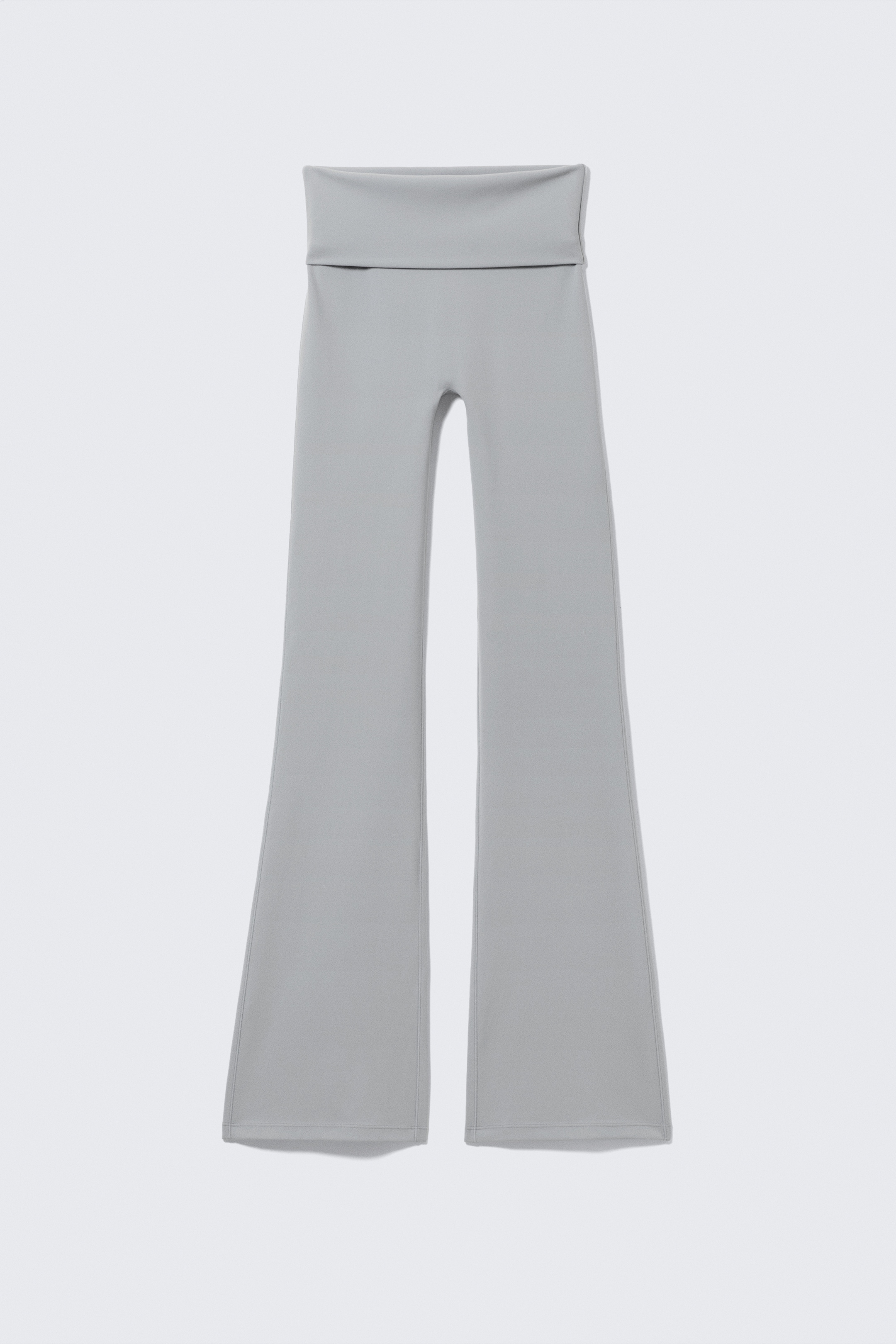 Visa större bild: Utsvängda yogatights med vikt midja - Ljus dimgrå - DAM | H&M FI 1