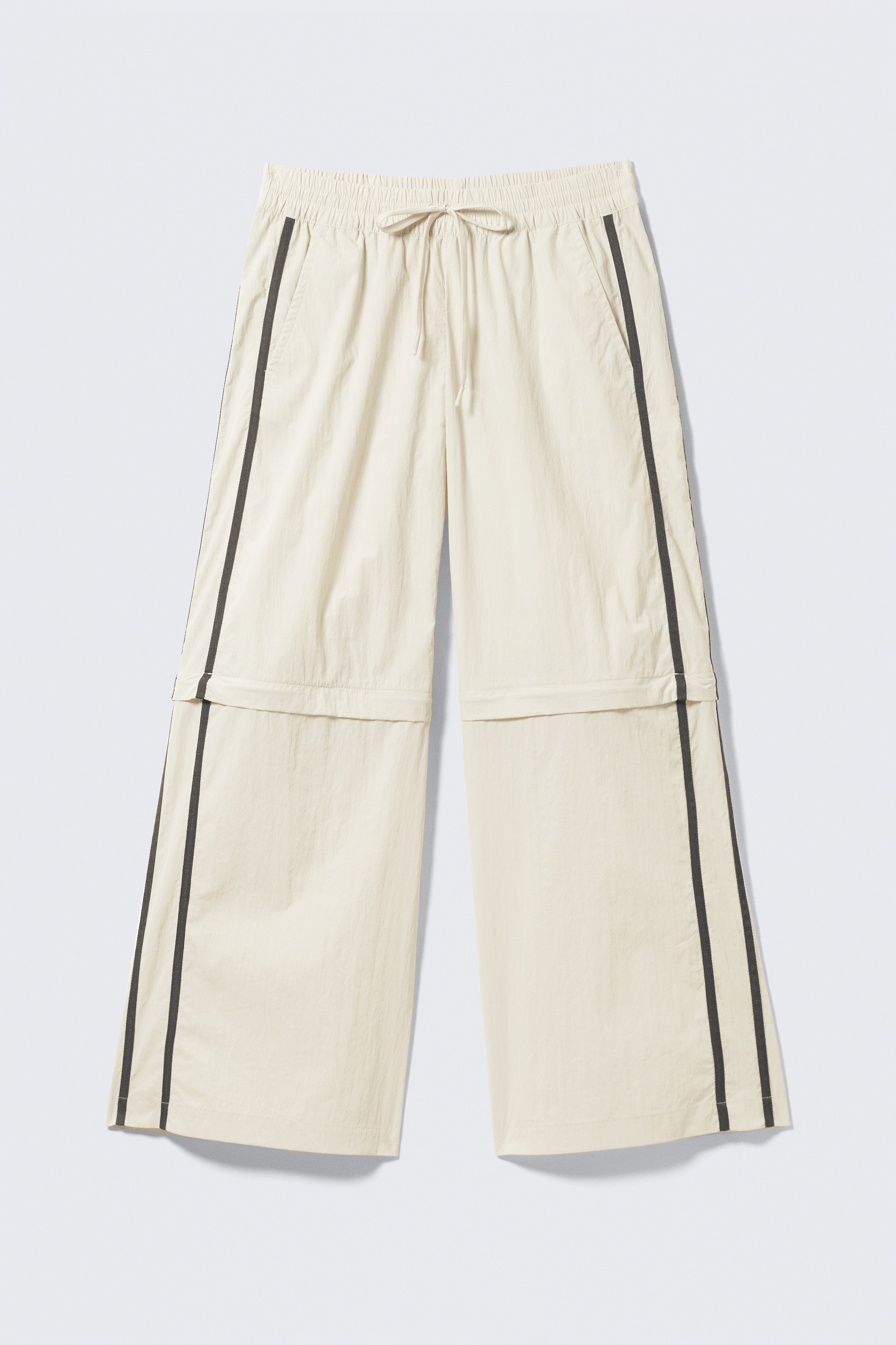 Pantaloni da tuta zip-off in nylon - Beige - Righe nere/Nero - Righe beige