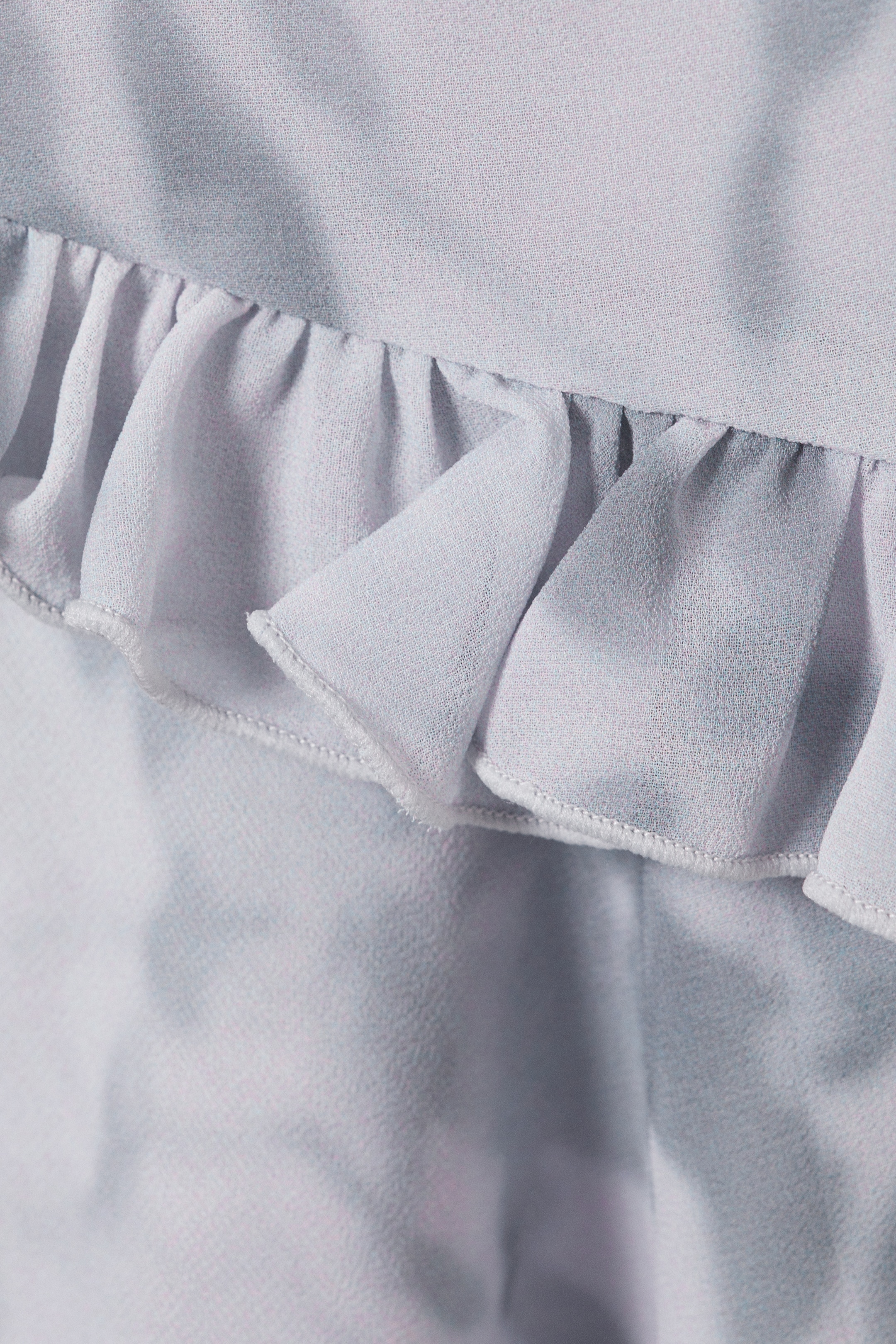 Grotere afbeelding bekijken: Frilled Strap Top - Dusty Grey - Clouded Marble - DAMES | H&M BE 2
