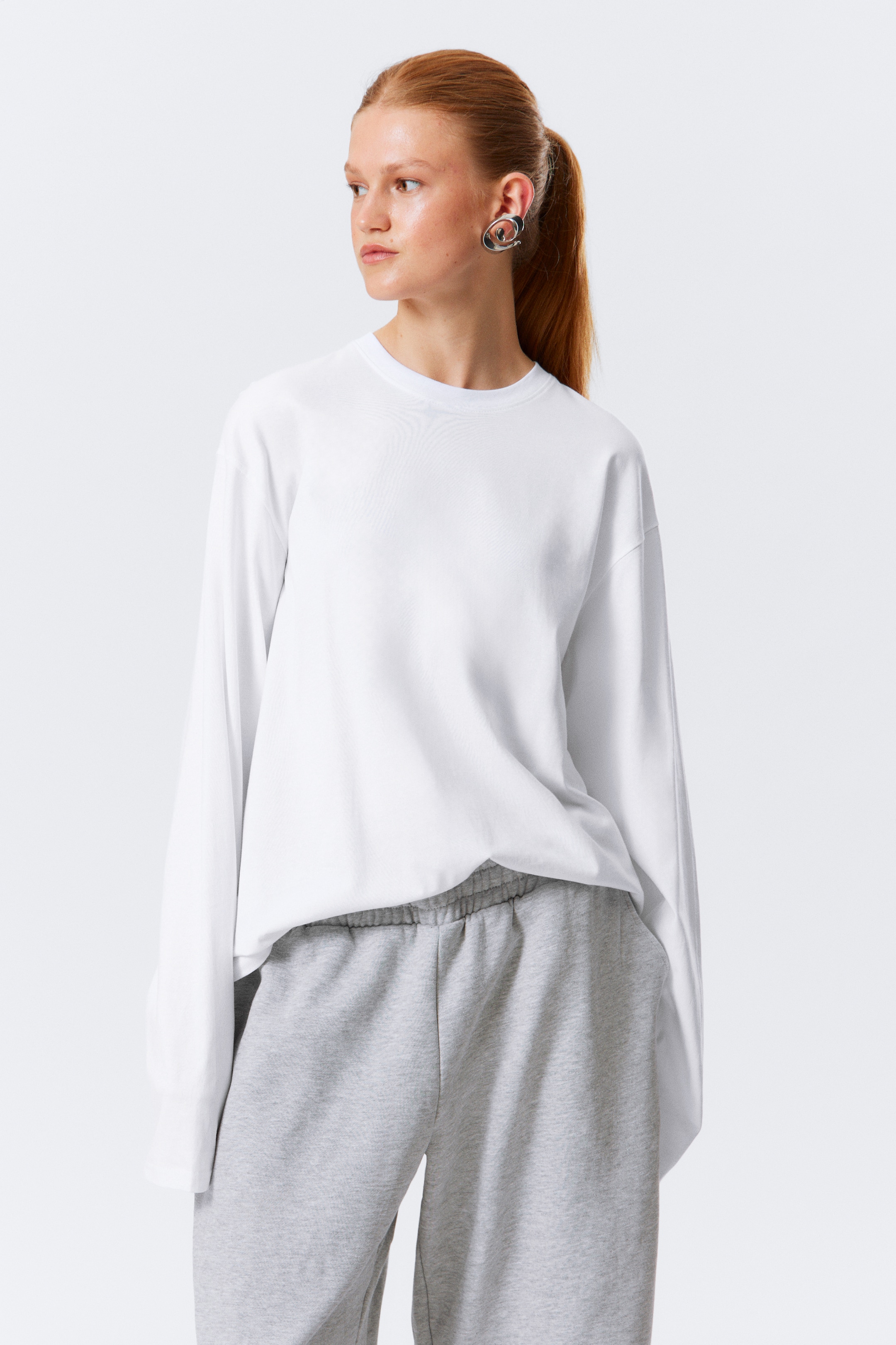 Visualizza immagine più grande: T-shirt boxy in cotone a maniche lunghe - Bianco - DONNA | H&M IT 1