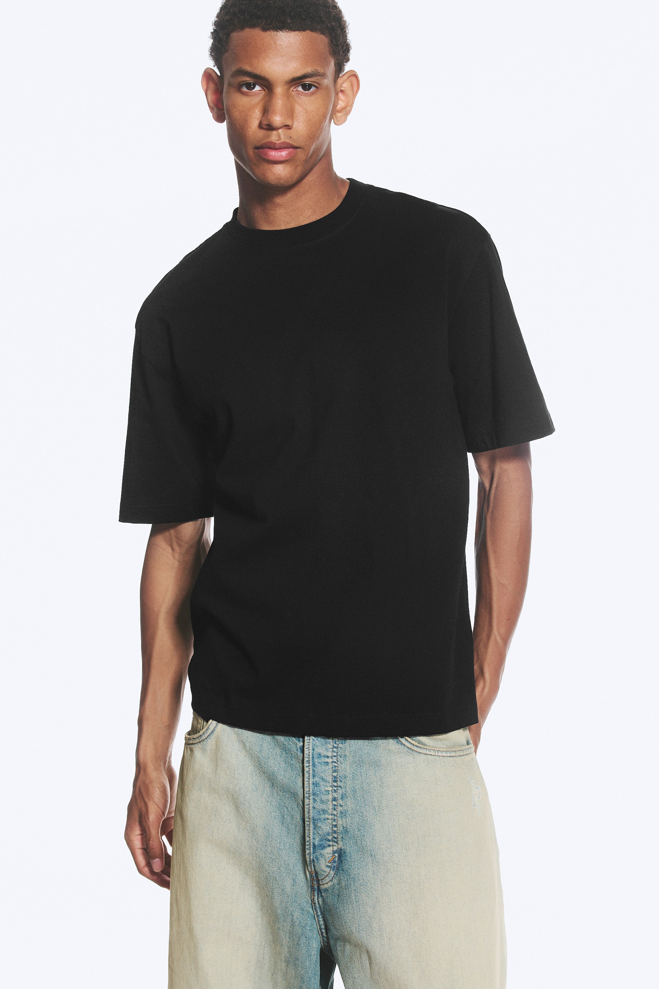 Grotere afbeelding bekijken: T-SHIRT RELAXED FIT - Zwart - HEREN | H&M NL 1