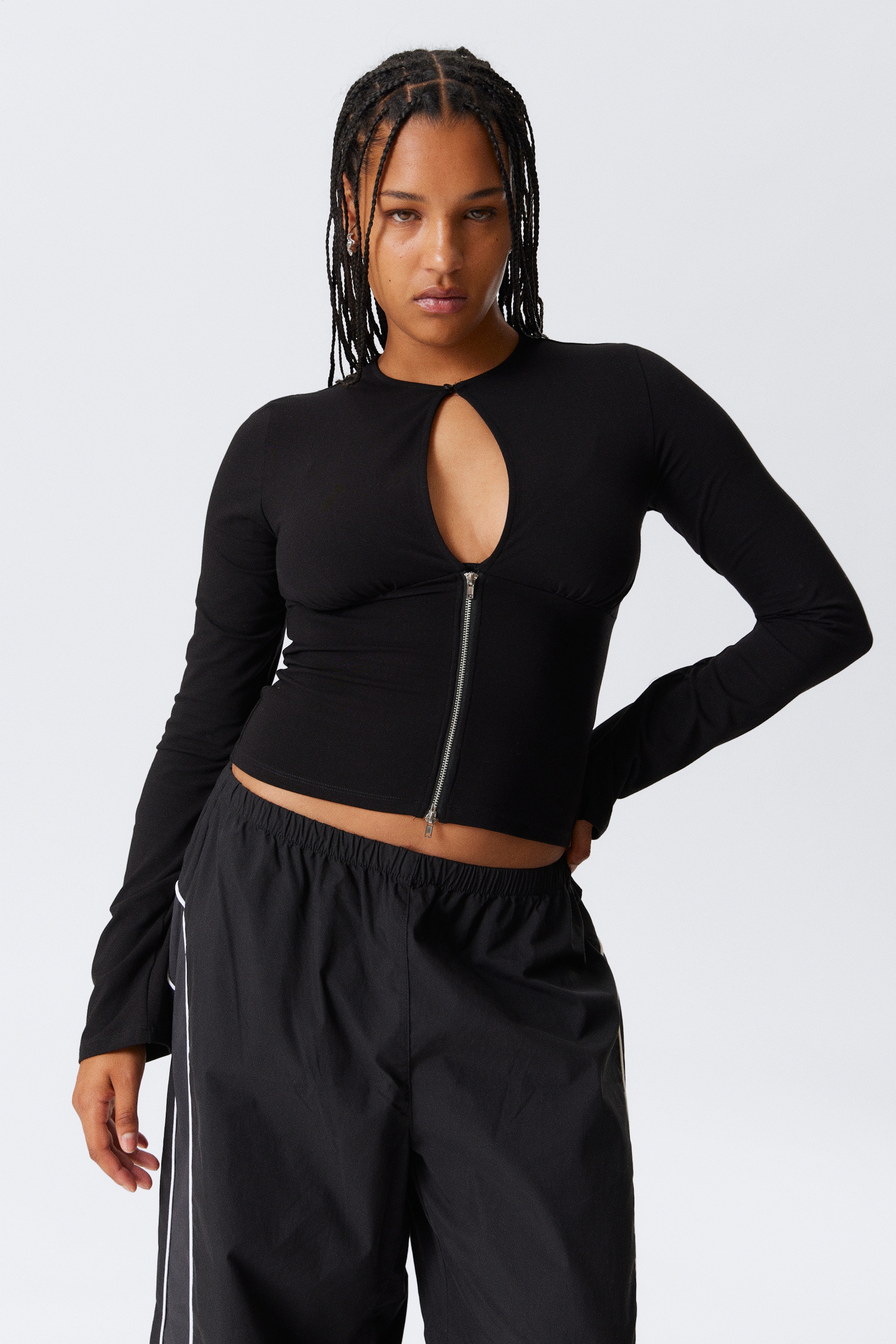 Grotere afbeelding bekijken: Slim fit top met rits en lange mouwen - Black - DAMES | H&M BE 1