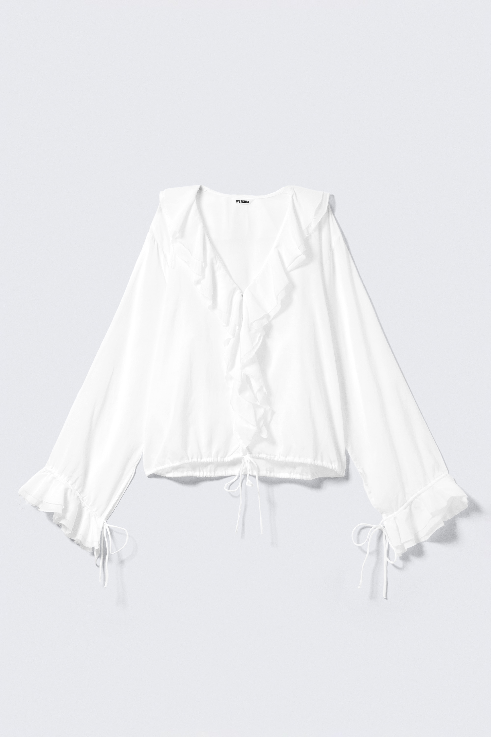 Langärmelige Wickelbluse mit Rüschen - Weiß/Schwarz/Braun