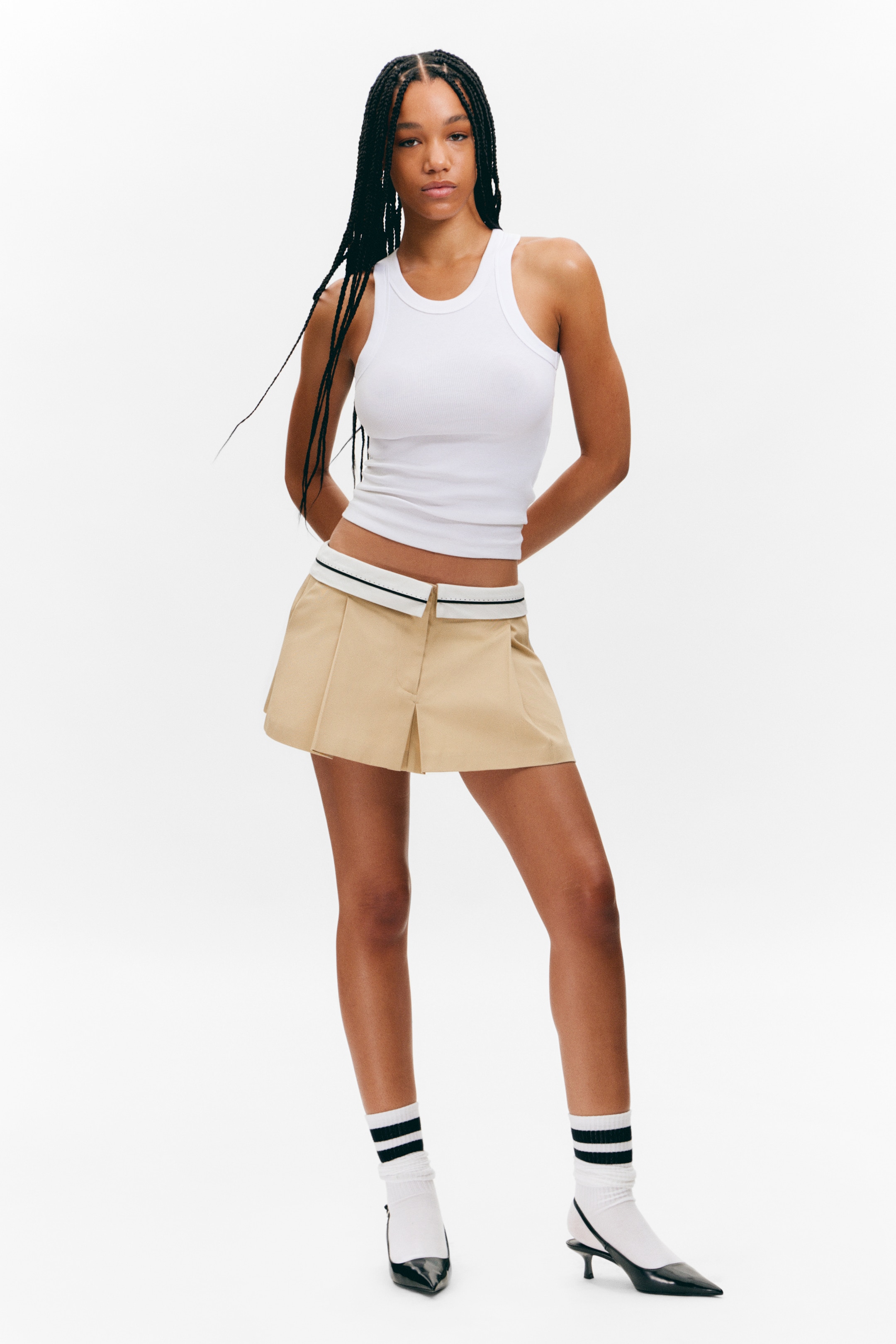 Größeres Bild anzeigen: Plissierter Minirock mit umgeschlagener Taille - Beige - Ladies | H&M AT 1