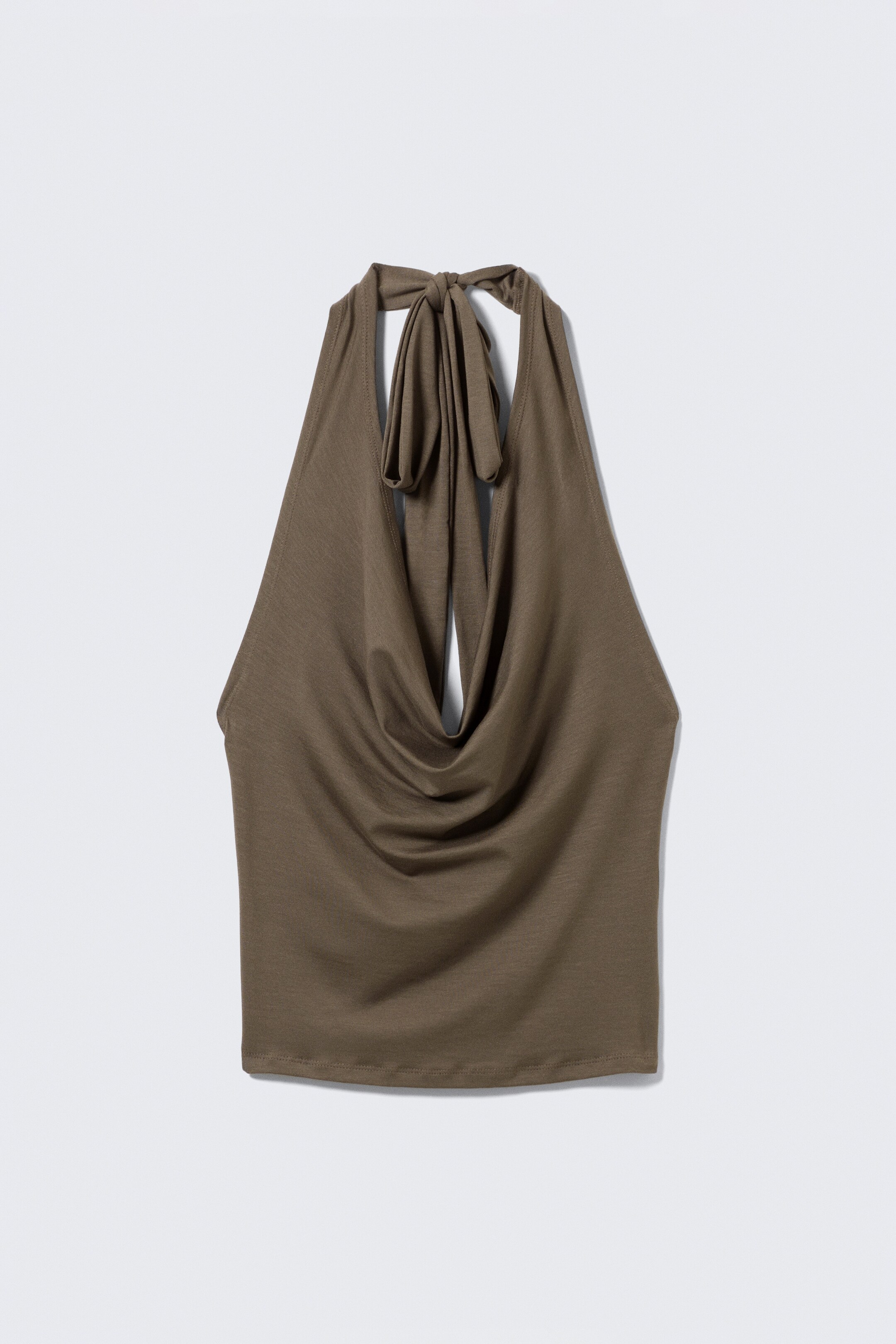 View larger image: An olive brown sleeveless halter top is presenting its front, showcasing a fluid cowl neckline. Long, double-layered straps are tying at the back of the neck, contributing to the top's soft drape.