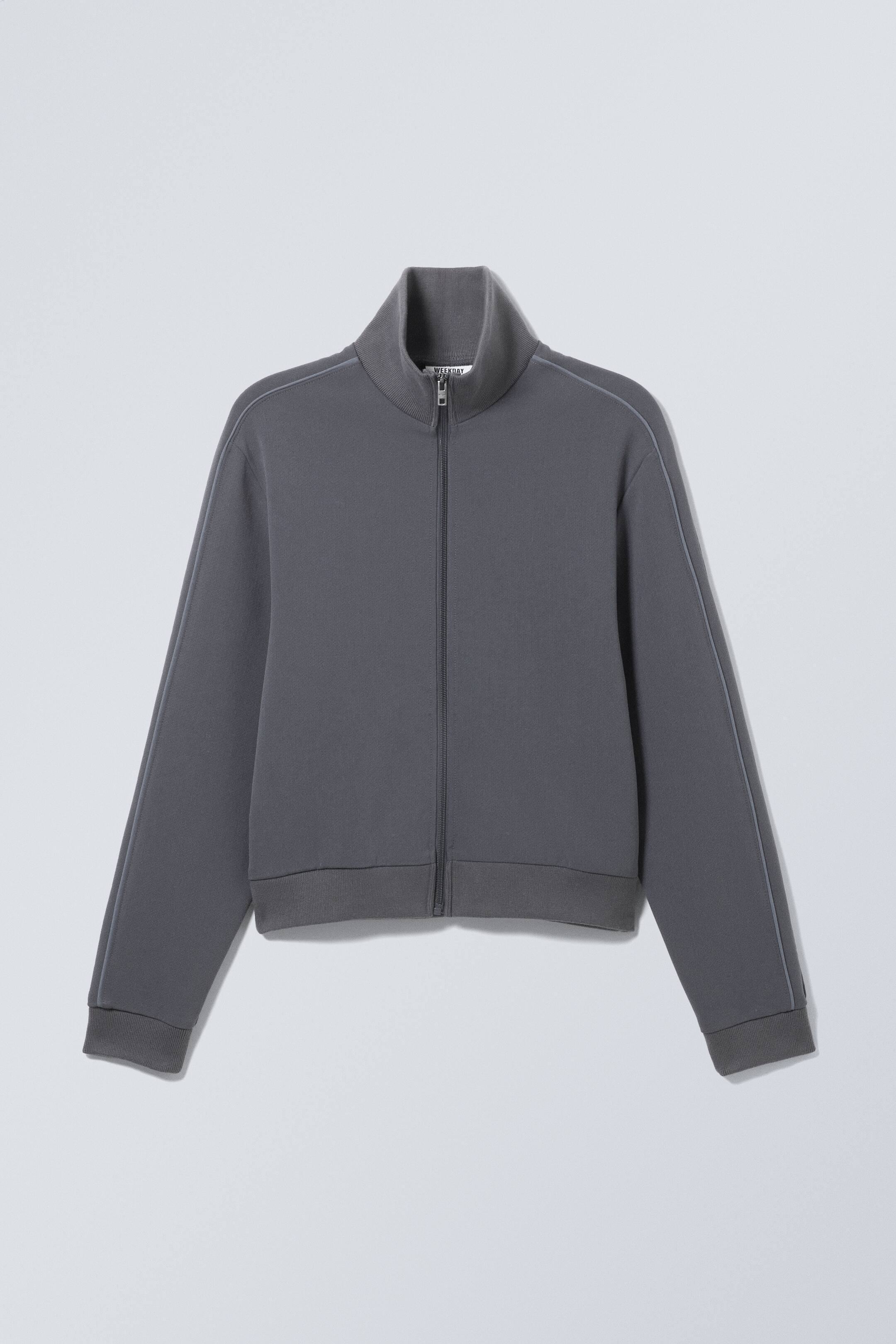 Näytä suurempi kuva: Vetoketjullinen verryttelytakki - Murrettu tummansininen - MIEHET | H&M FI 1