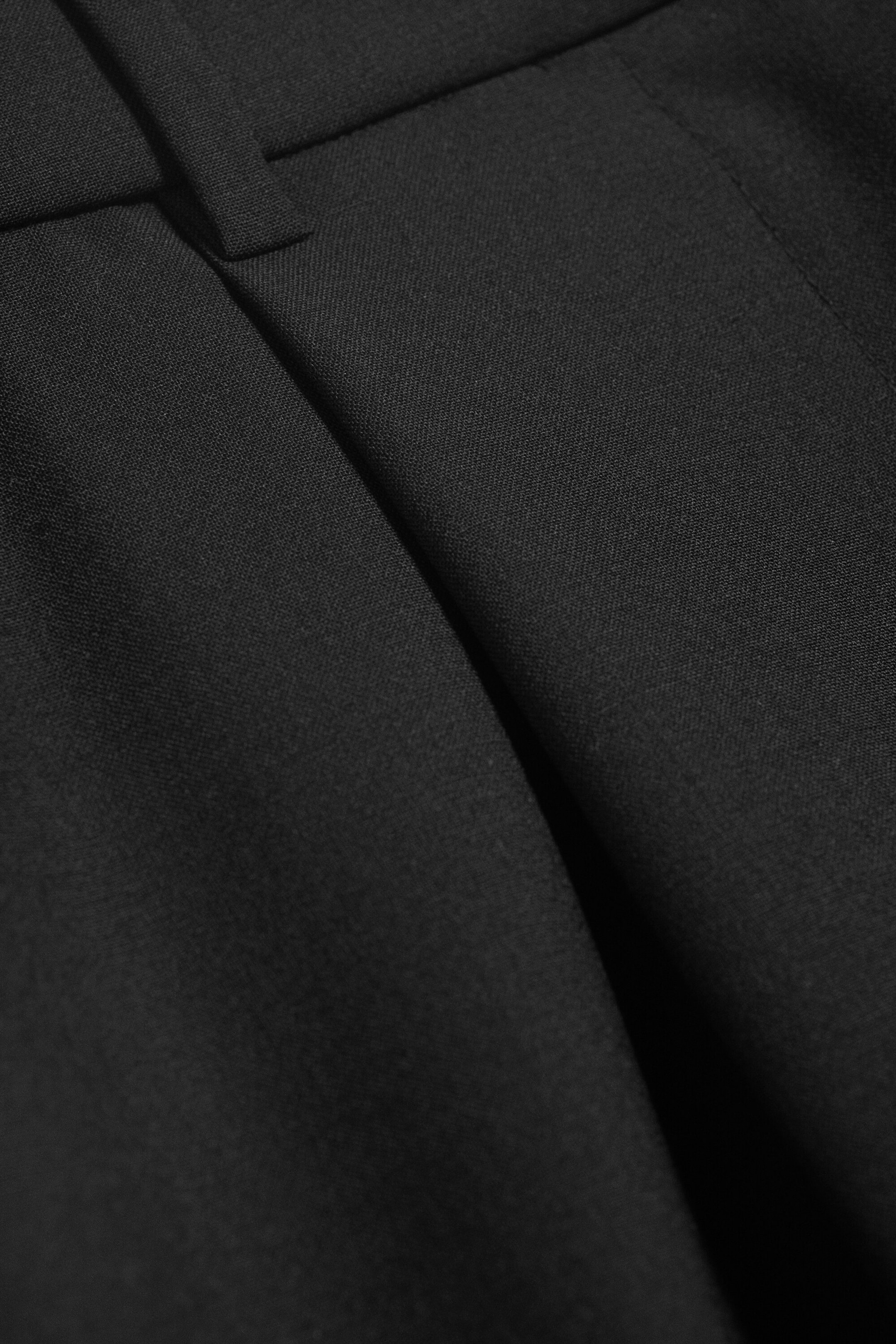 Schwarz - Low-Rise Anzughose aus Wollmix mit weitem Bein - 6