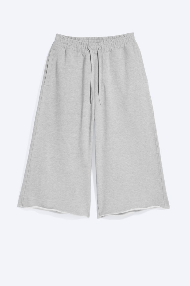 Pantalón de chándal holgado de tres cuartos - Gris claro empolvado jaspeado/Negro lavado - 1