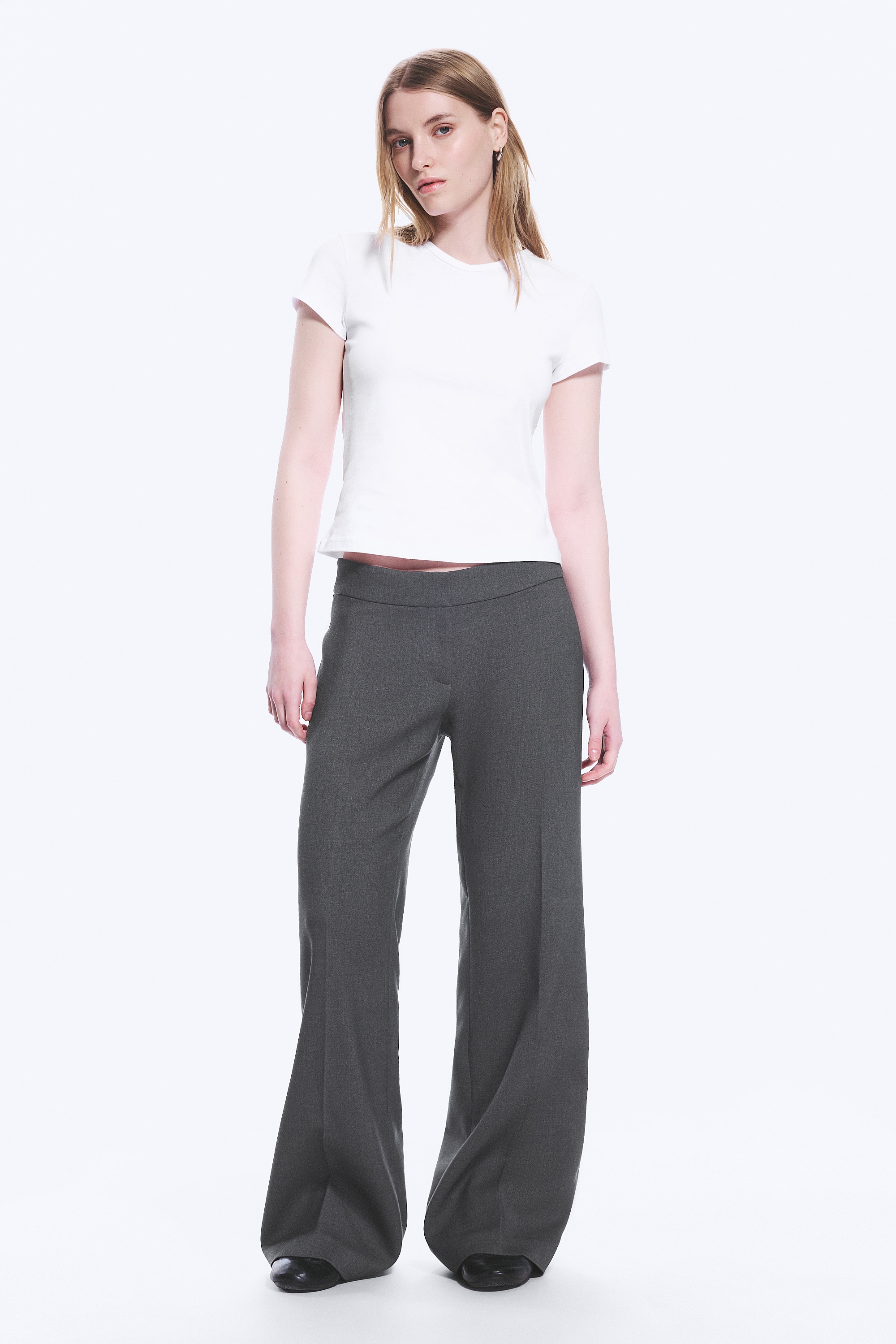 Uitlopende pantalon met halfhoge taille