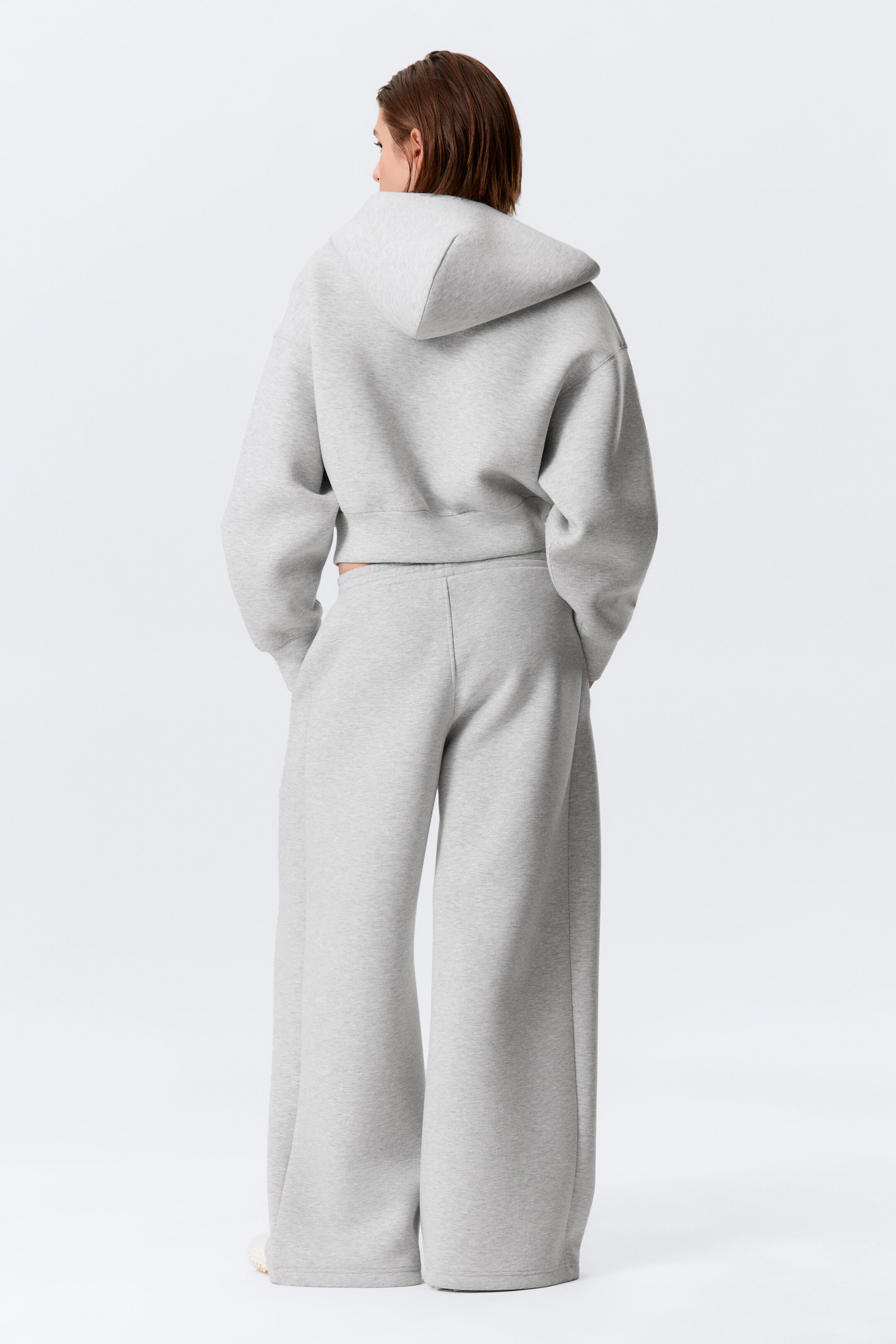 Zobraziť väčší obrázok: Voľné široké nohavice zo scuba materiálu - Sivá melírovaná - ŽENY | H&M SK 4