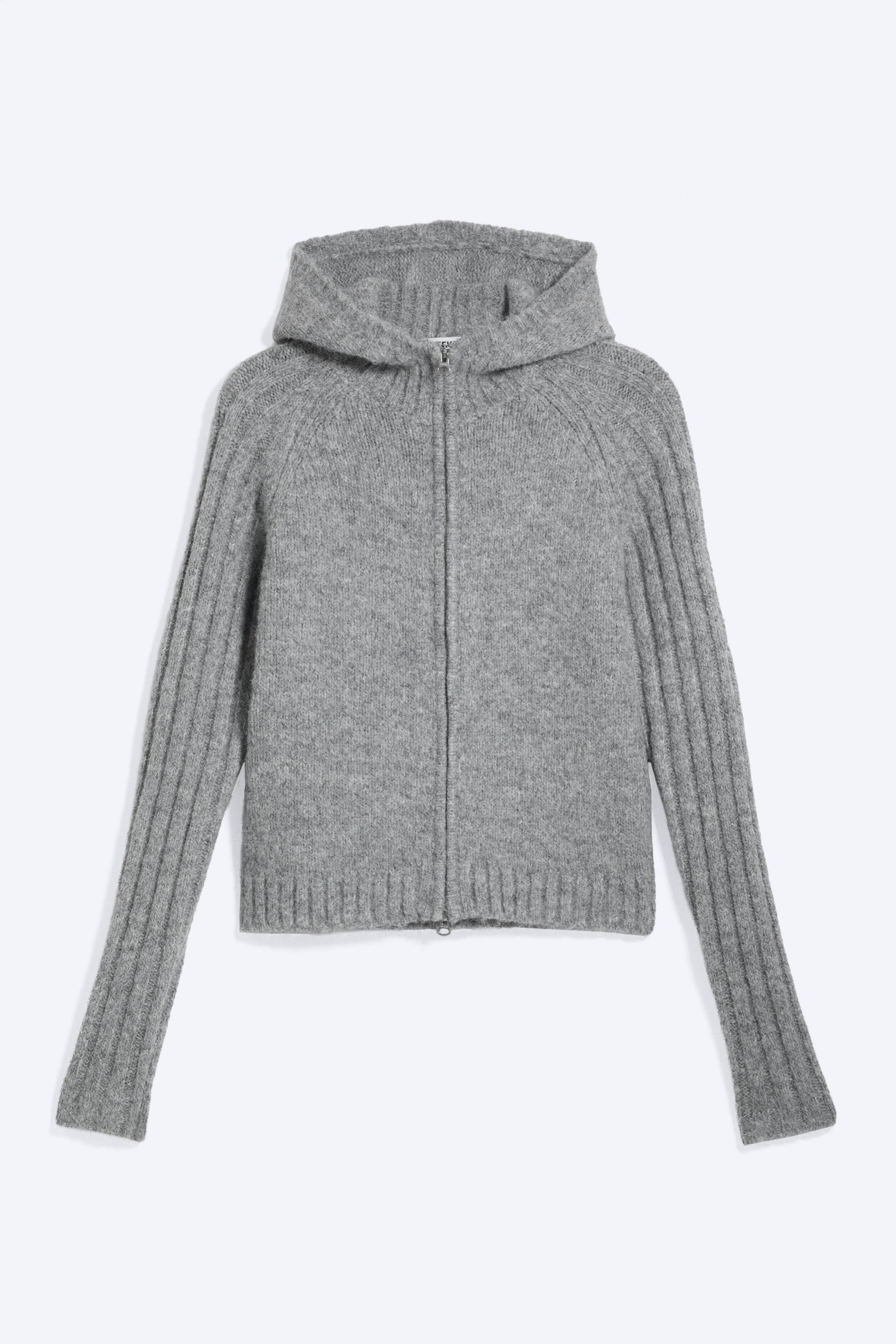 View larger image: A grey knitted hooded cardigan is displayed front-facing, featuring a full-length zip fastening, raglan sleeves with vertical ribbed panels along the outer arms, and ribbed cuffs and hem.