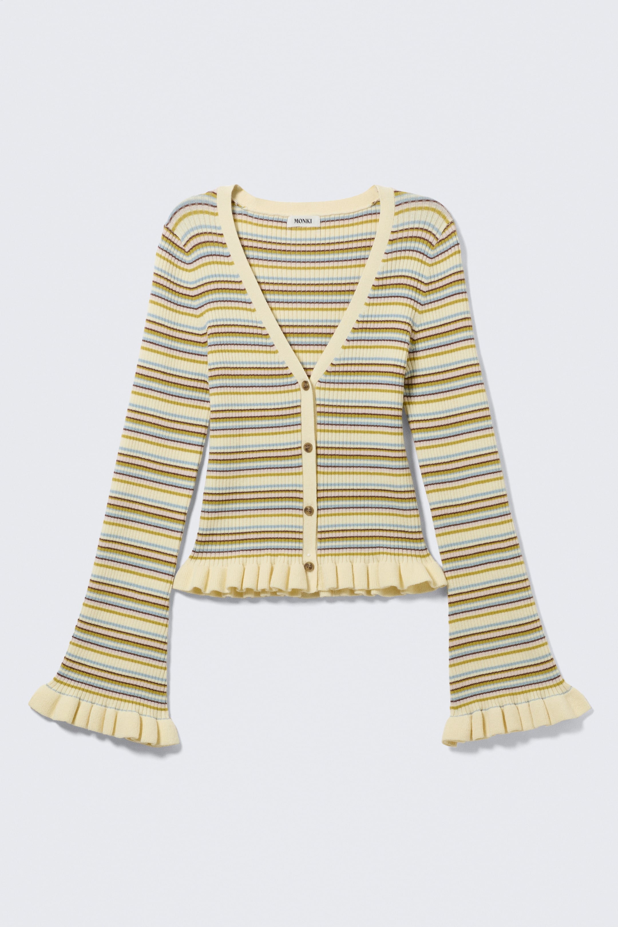 Vis større bilde: En blekgul ribbestrikket cardigan presenteres som FRONT, med horisontale striper i lyseblått, olivengrønt og mørkebrunt, en V-hals og en knappefront med fem runde, lysebrune knapper. Den er designet med lange klokkeermer og volangkant både ved mansjettene og den korte falden.
