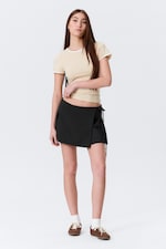 Black - Low Rise Pleated Mini Wrap Skirt - 0