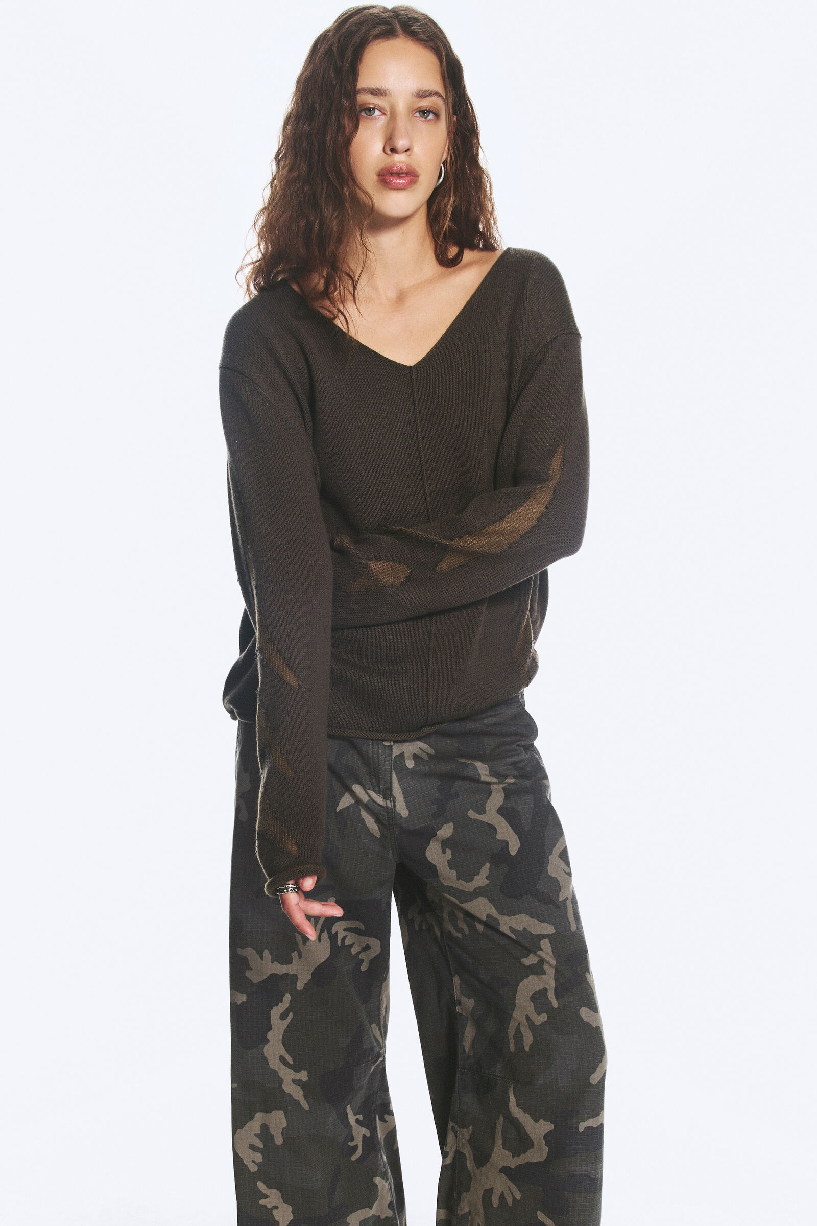 Distressed V-neck jumper