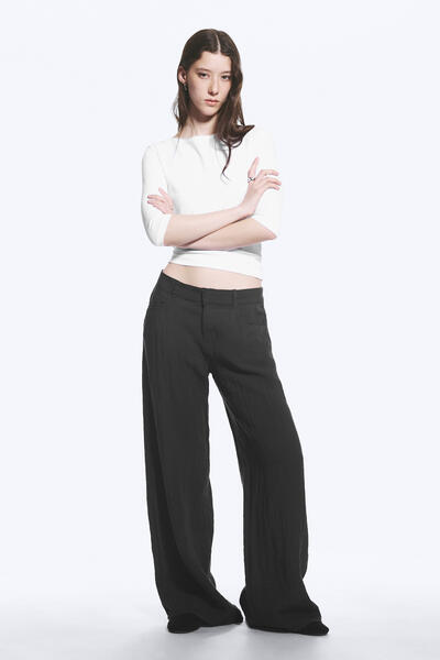 Crinkle low-waist trousers