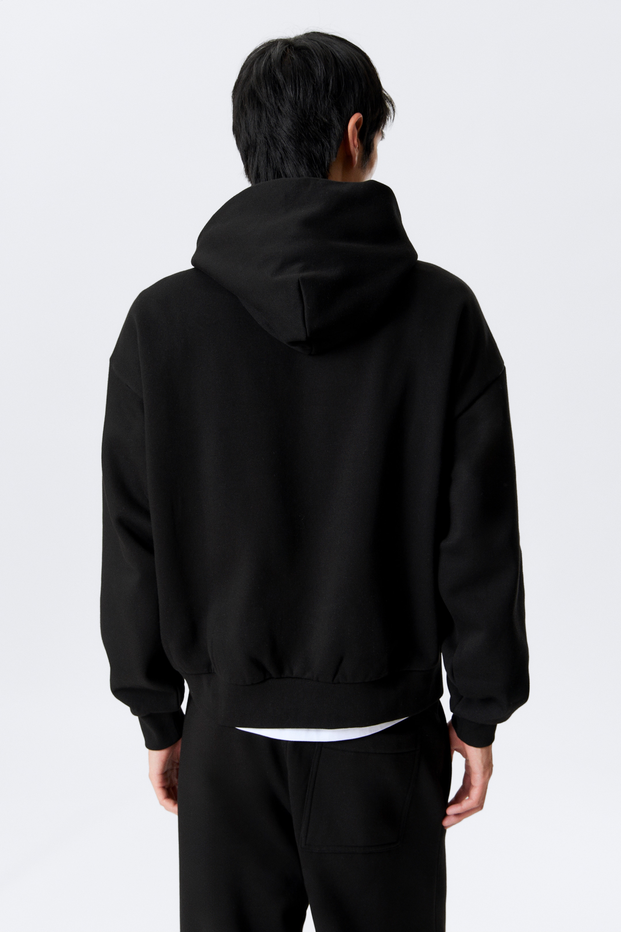 Größeres Bild ansehen: Hoodie mit weiter Passform - Schwarz - Men | H&M DE 3