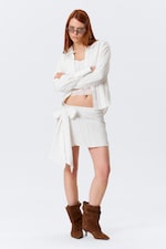 Off-white - Kort lågmidjad omlottkjol med rosett - 0