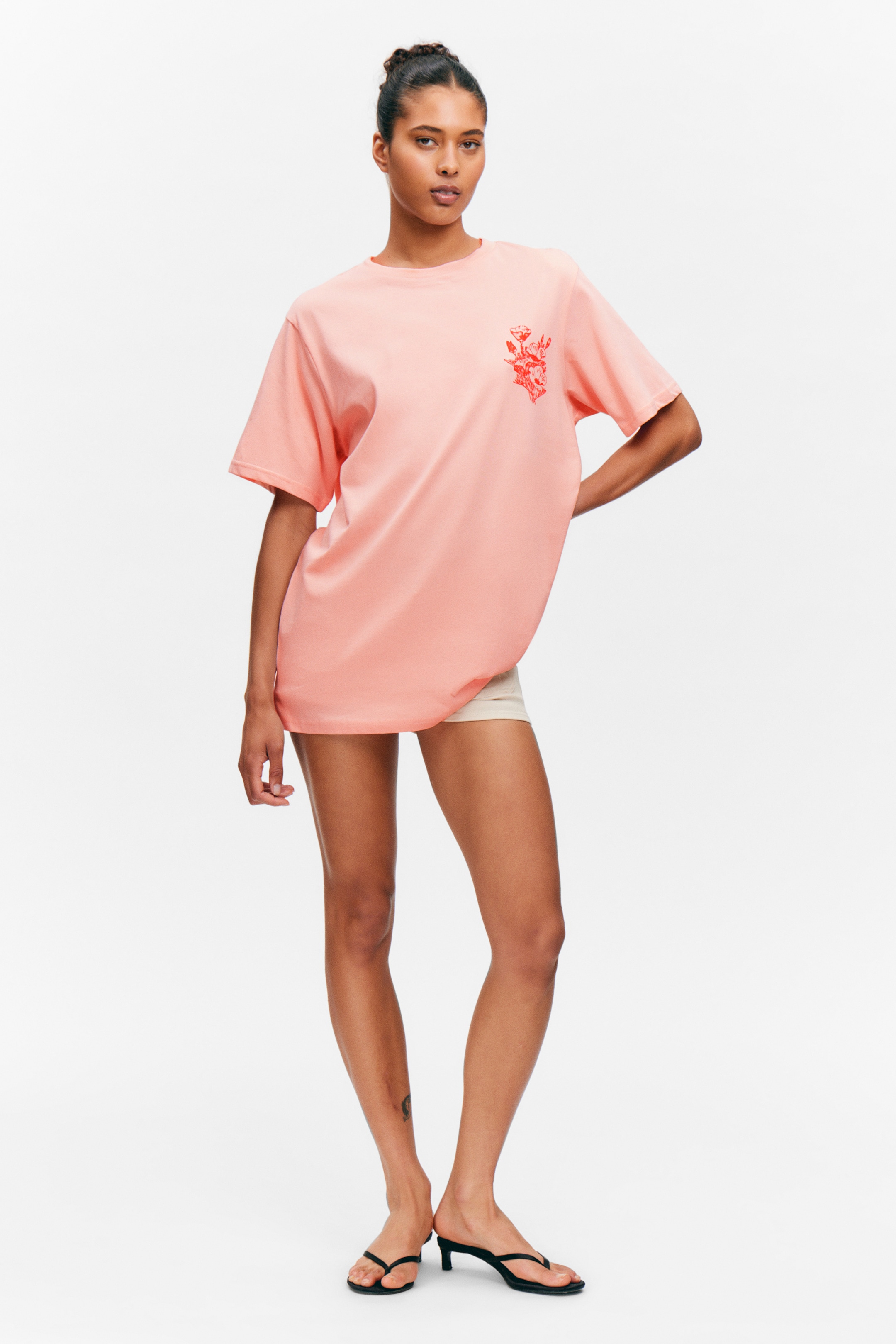 Größeres Bild ansehen: Oversized-T-Shirt aus Baumwolle mit Grafik - Hellrosa – Blumenprint - Ladies | H&M DE 1