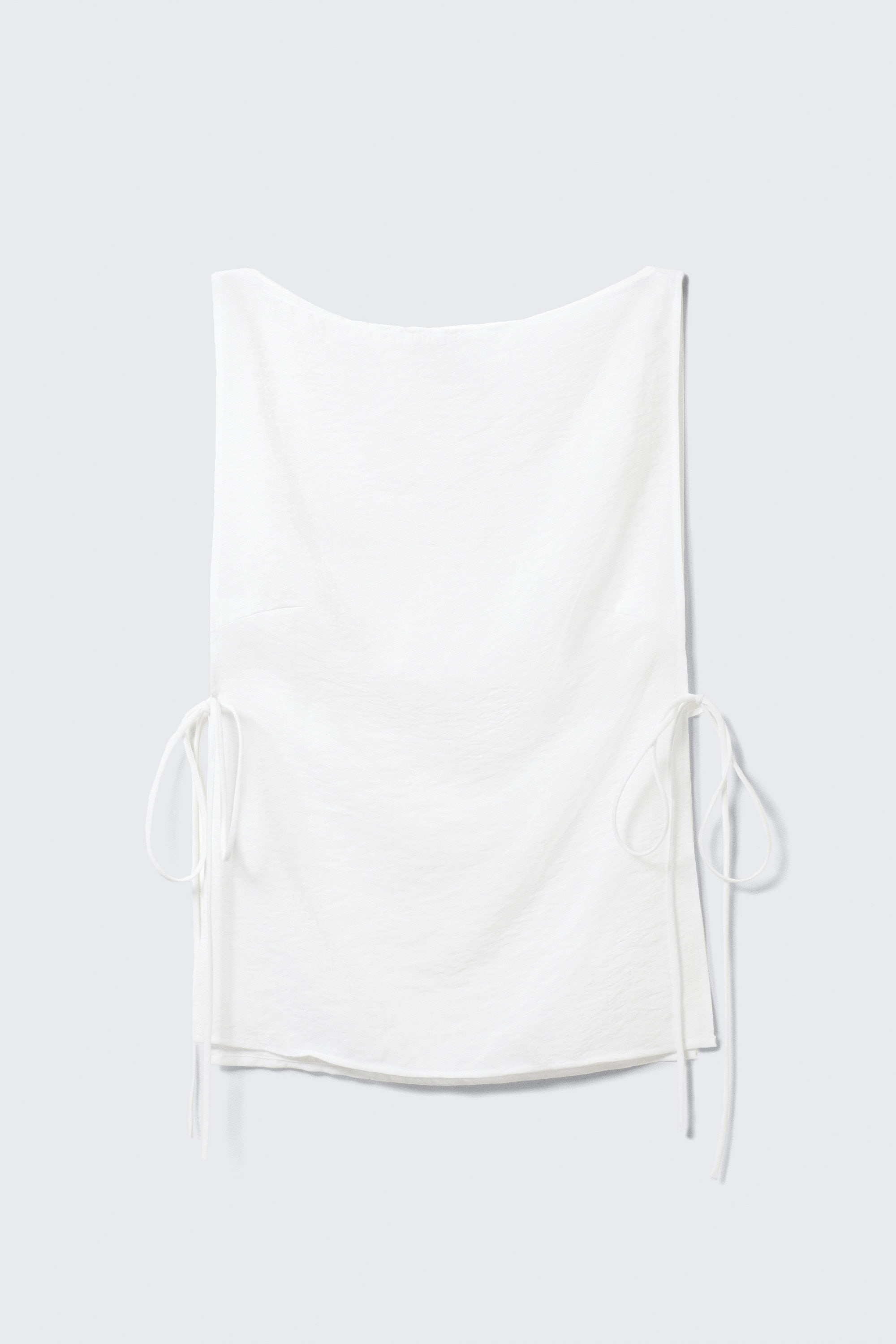 Wit - Mouwloze top met boothals en strikbandjes - 1