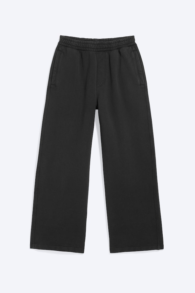 Weite Sweatpants aus schwerem Baumwoll-Frottee - Used Black/Ausgewaschenes Dunkelgrau - 1