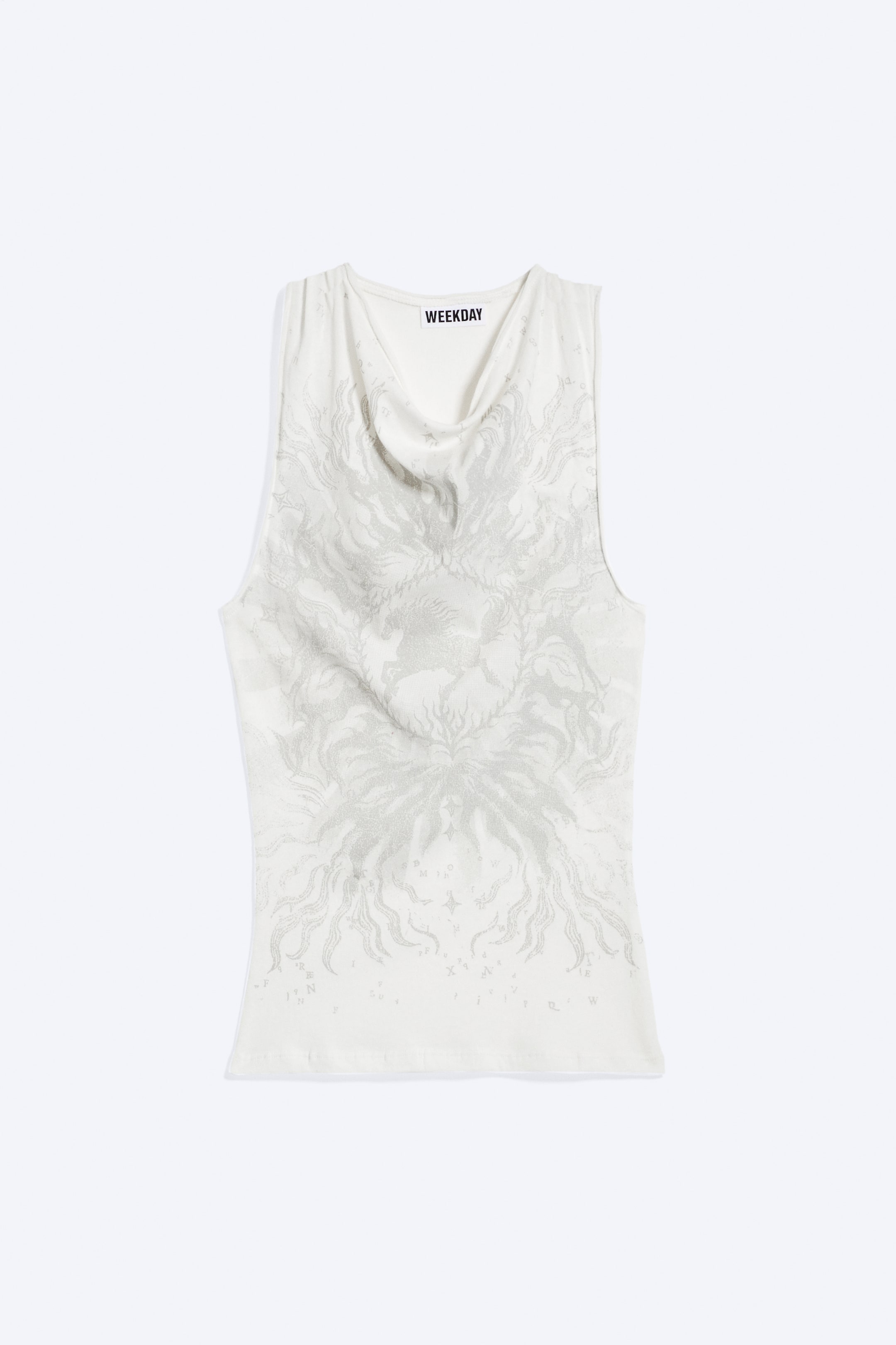 Visualizza immagine più grande: Un top senza maniche presenta un collo a cascata drappeggiato e un intricato motivo grafico grigio chiaro scintillante sul davanti bianco sporco, raffigurante un design simile a un sole con linee radianti e piccoli simboli.