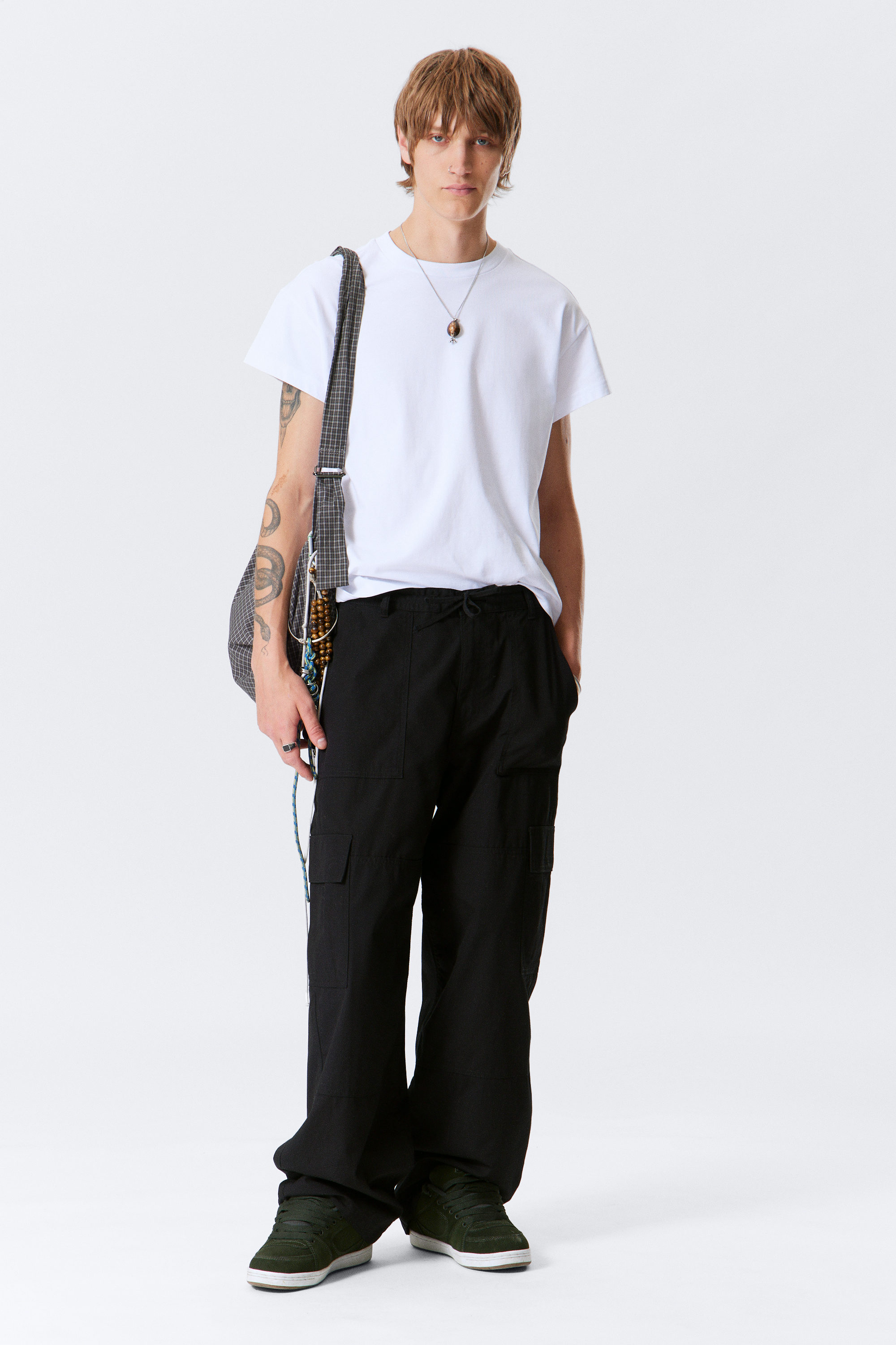 Schwarz - Baggy-Cargohose aus Ripstop - 1