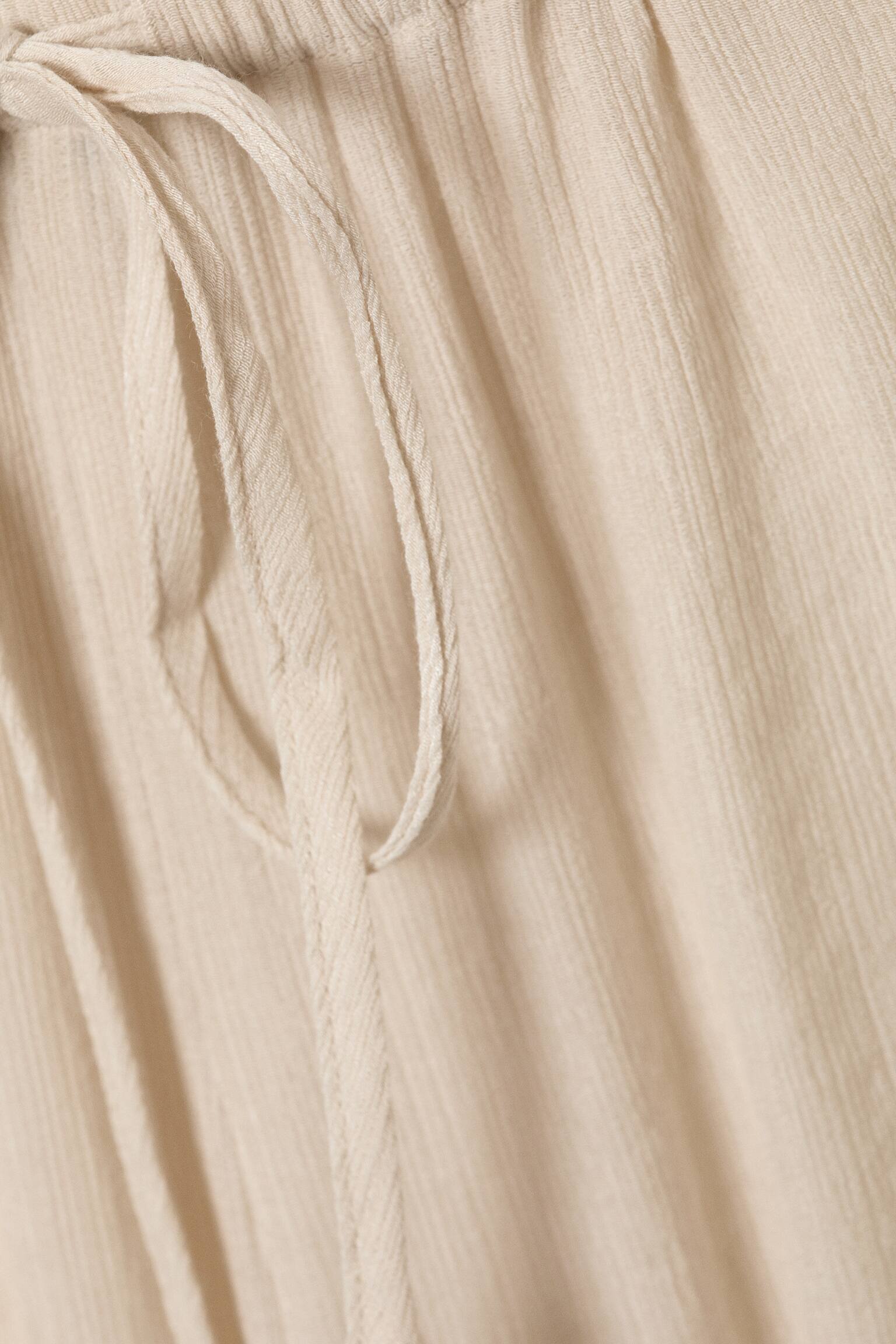 Lediga byxor med volang - Ljusbeige/Brun/Beige - Ormskinnsmönstrad - 4