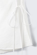 White - Sleeveless Boat-Neck Tie Top - 1