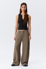 Beige - Weite, niedrig sitzende Hose in Knitteroptik - 0