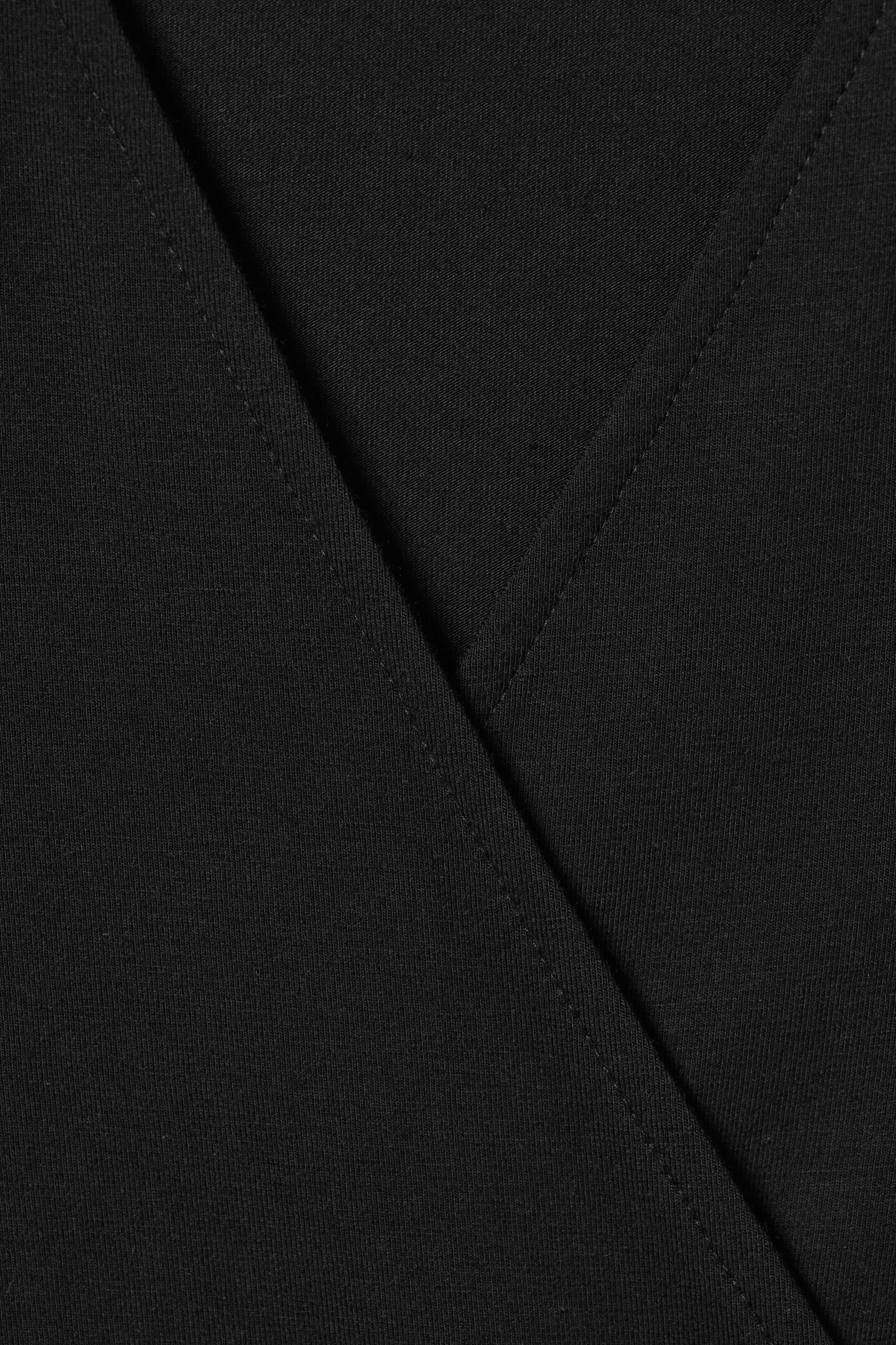 Grotere afbeelding bekijken: MOUWLOZE JERSEY OVERSLAGTOP - Zwart - DAMES | H&M NL 5
