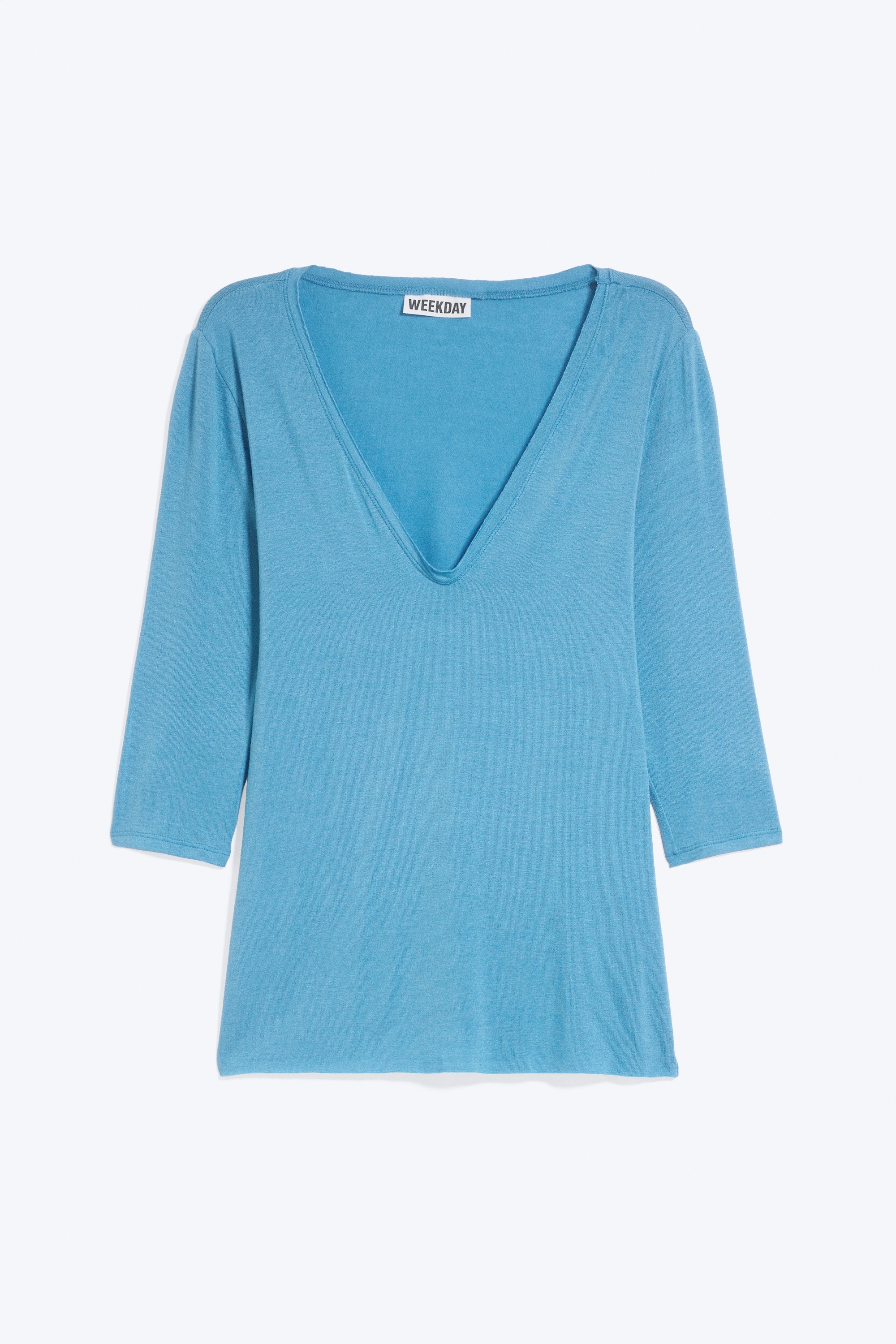 Deep V-neck three-quarter sleeve top