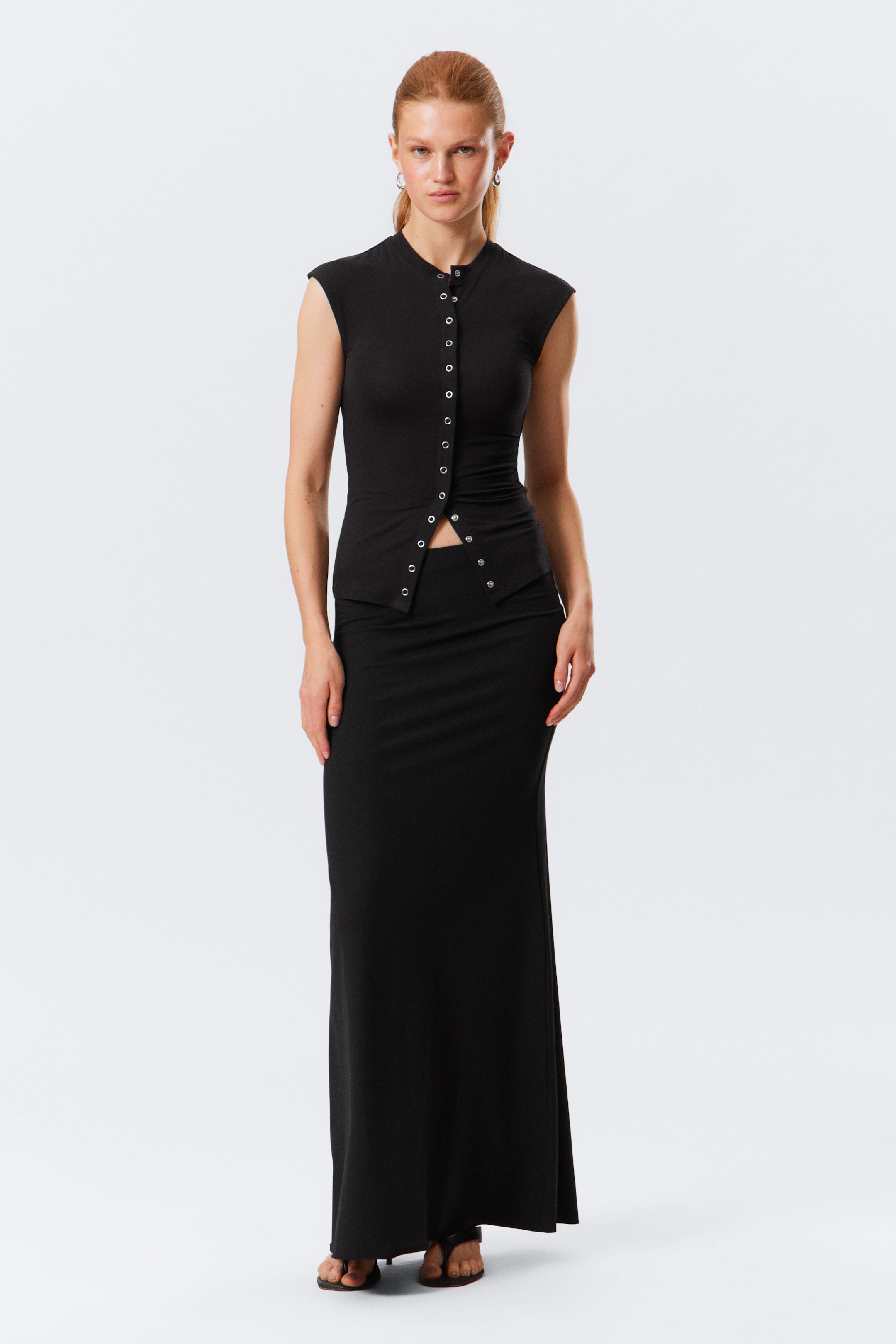 Zobrazit větší obrázek: Mid Rise Slim Fit Maxi Skirt - Black - ŽENY | H&M CZ 1