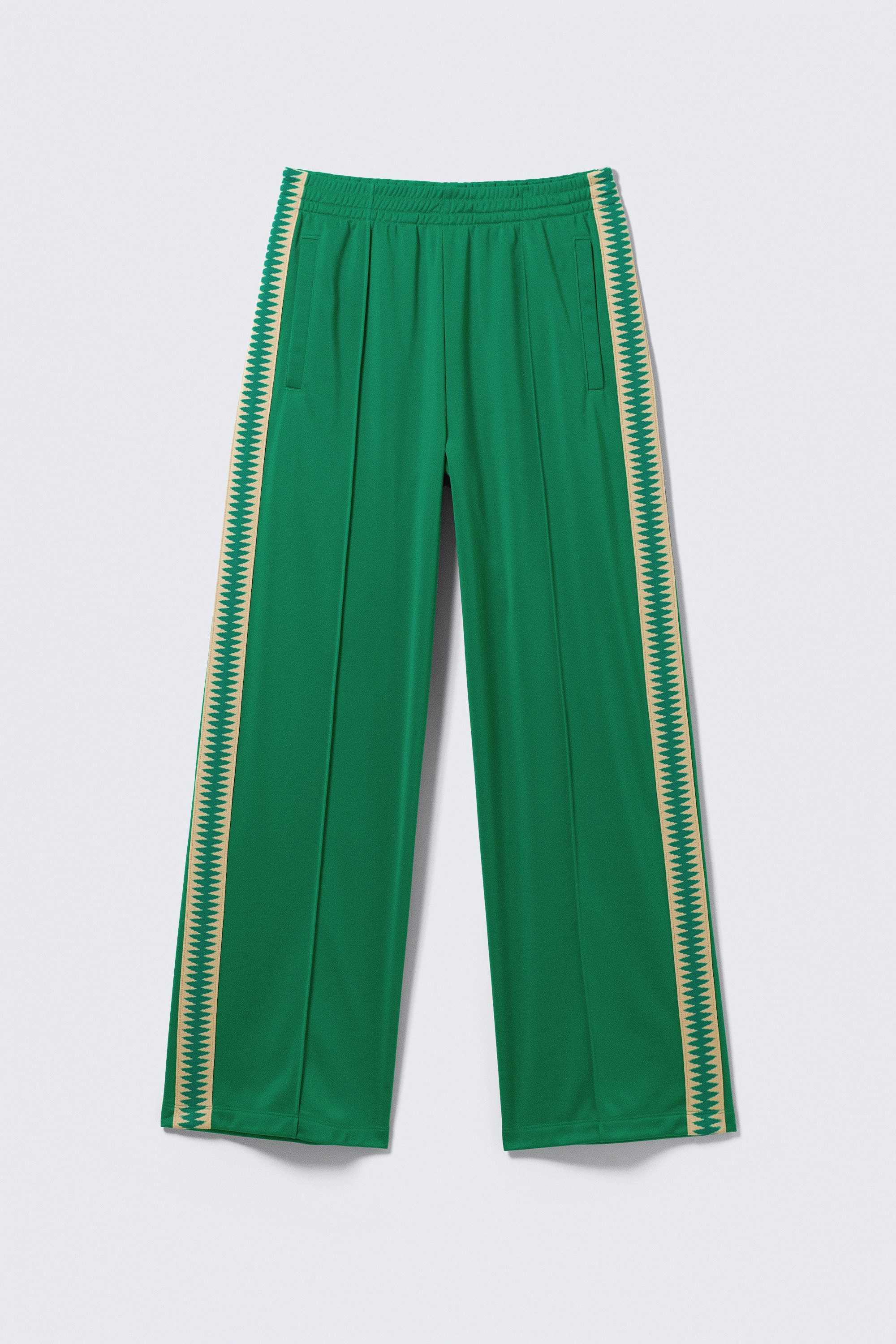 Relaxované tepláky s kontrastnými pruhmi - Zelená/Čierna