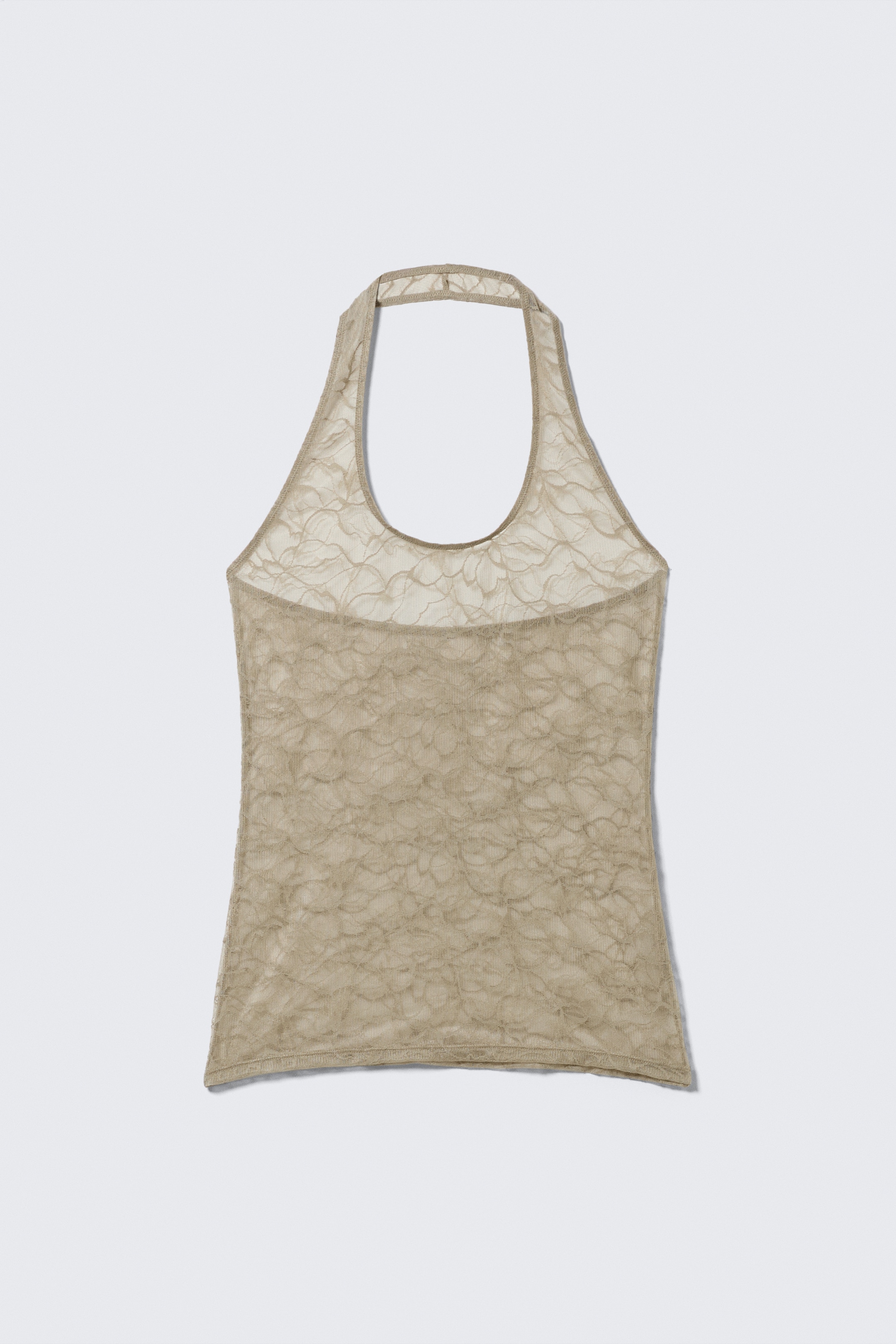 Agrandir l'image: DEVANT. Un haut dos nu beige présente une superposition de dentelle transparente avec un motif floral, offrant une silhouette ajustée. Il est conçu avec un décolleté rond et une bande côtelée distincte positionnée sous le buste.