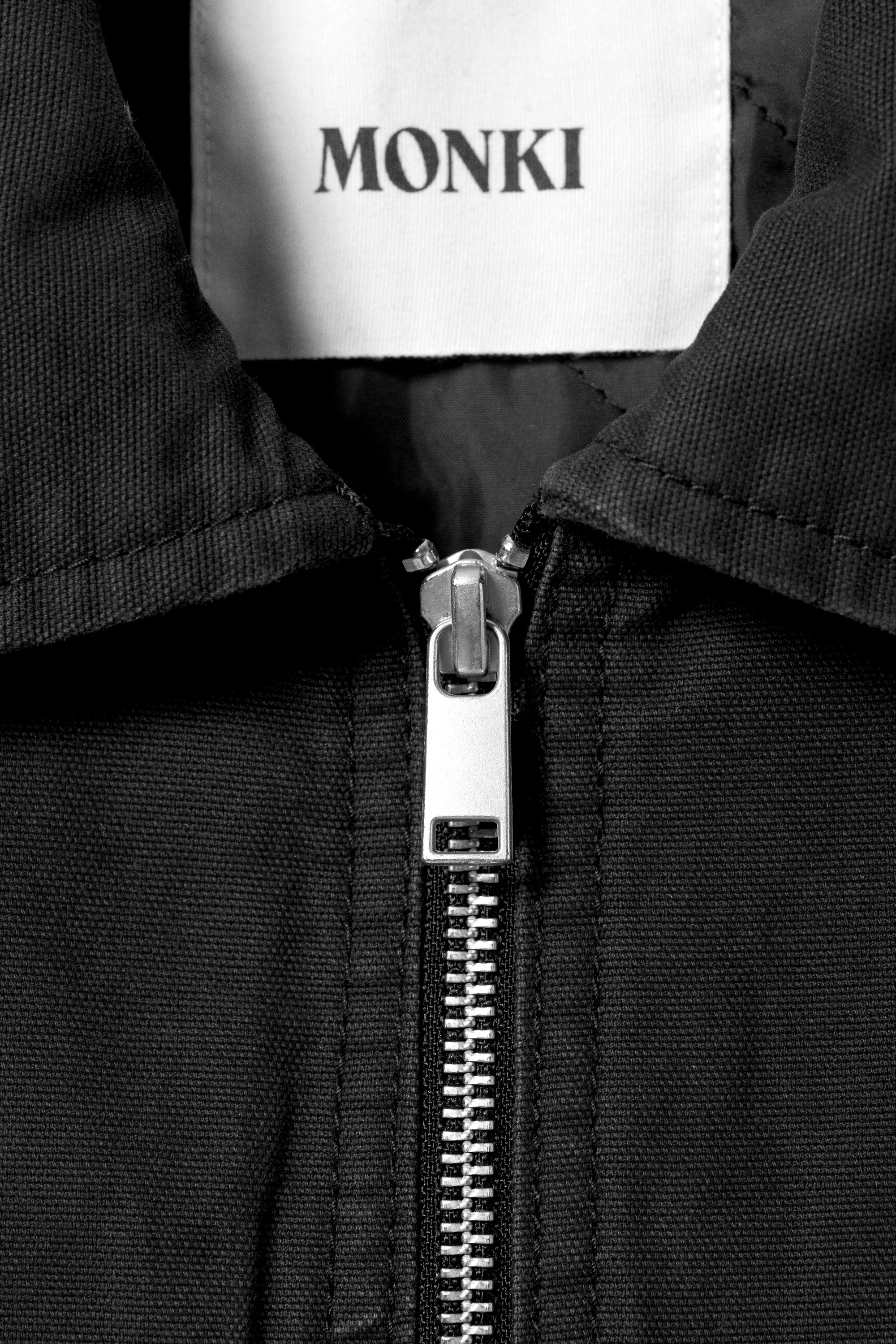 lightly padded canvas zip vest - Black | Monki WW