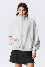Grau meliert - Lockerer Zip-Cardigan mit Trichterkragen - 1