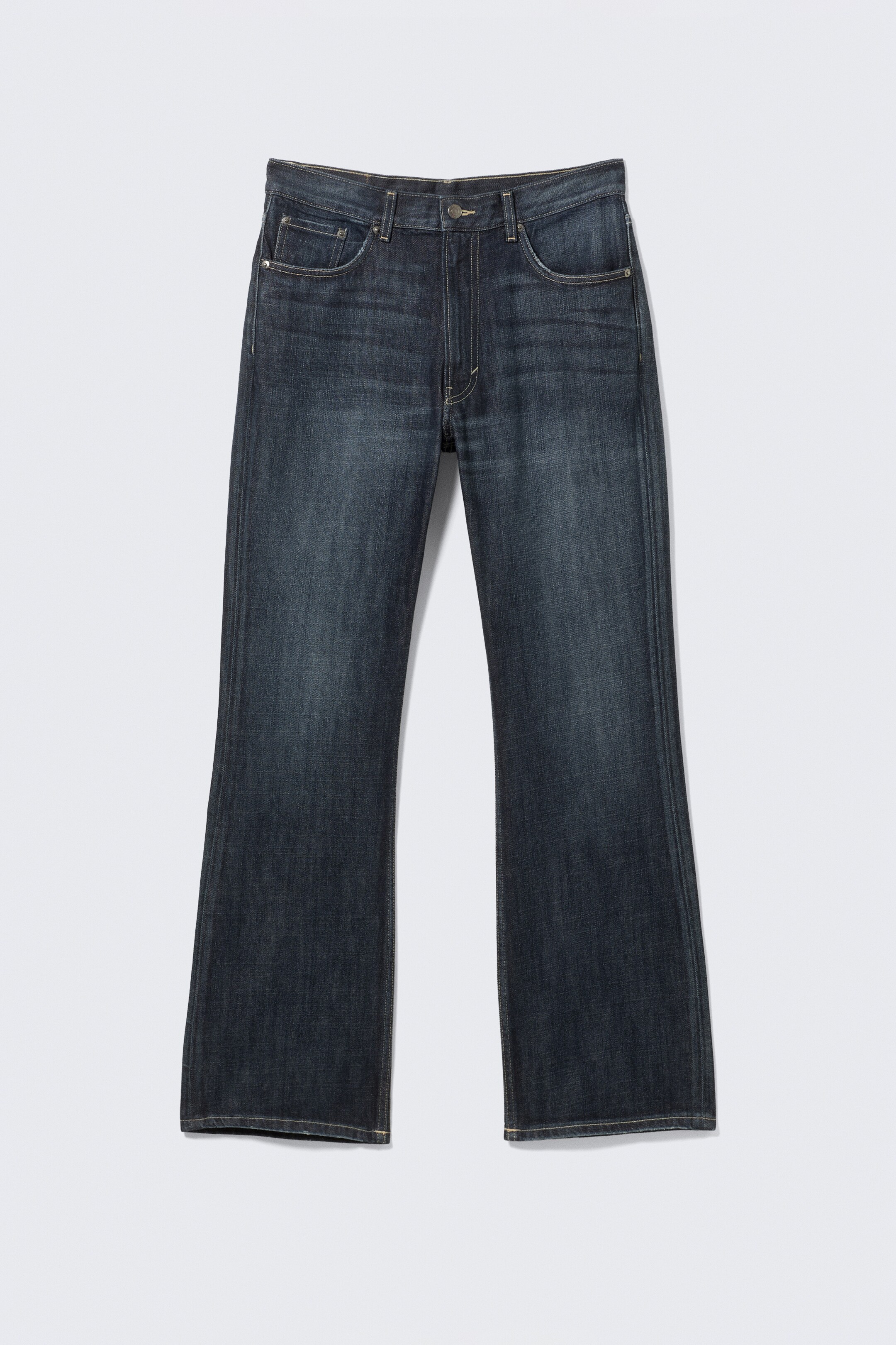 View larger image: A pair of dark wash relaxed fit jeans is presenting as FRONT, featuring a bootcut leg and a long length. These jeans are showcasing a streaky denim texture with faded areas on the thighs, a classic 5-pocket design, and a zip fly closure.