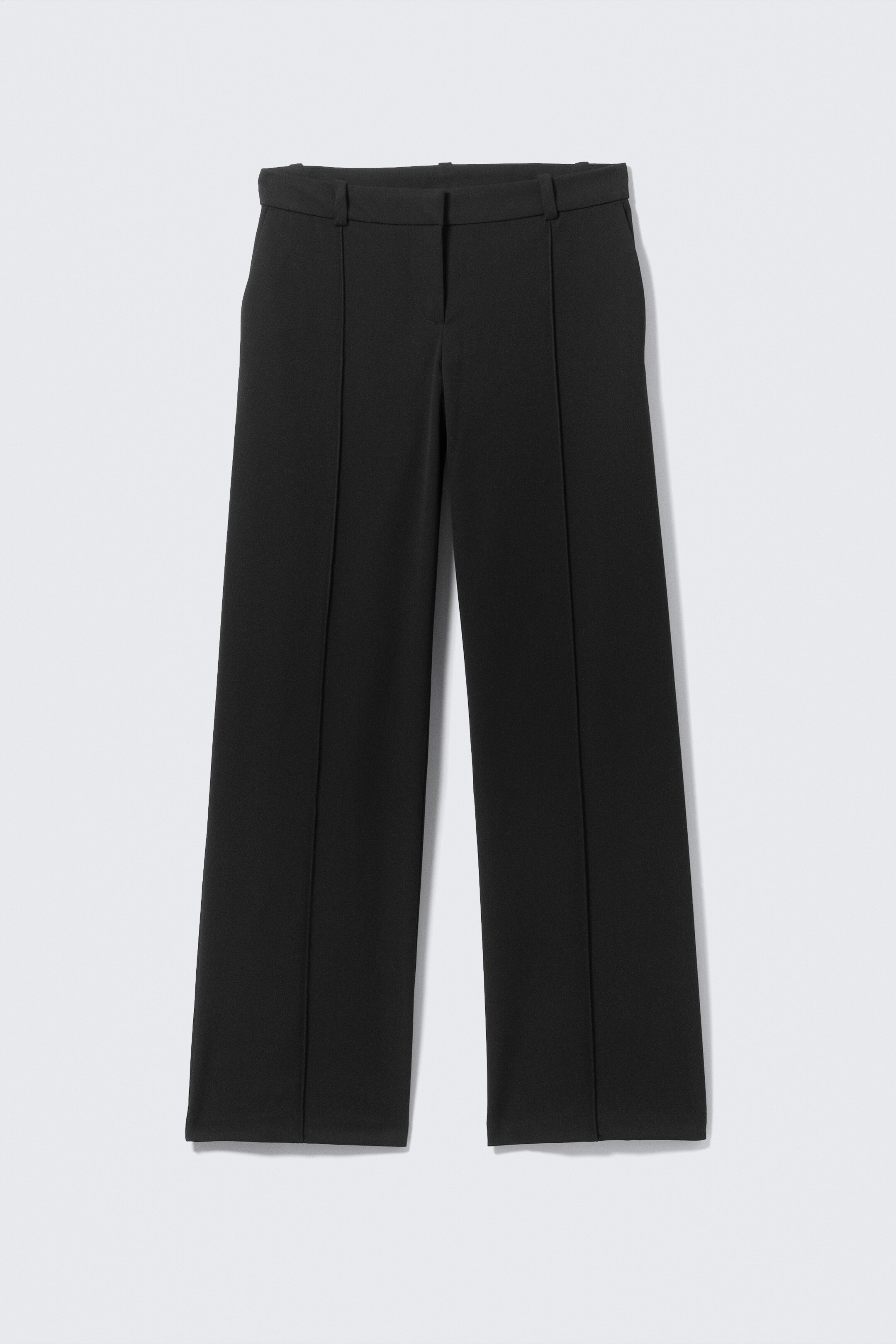 View larger image: The black pants are featuring a flat waistband with belt loops and vertical stitched seams running down the center front of each wide leg, presented from a FRONT view.