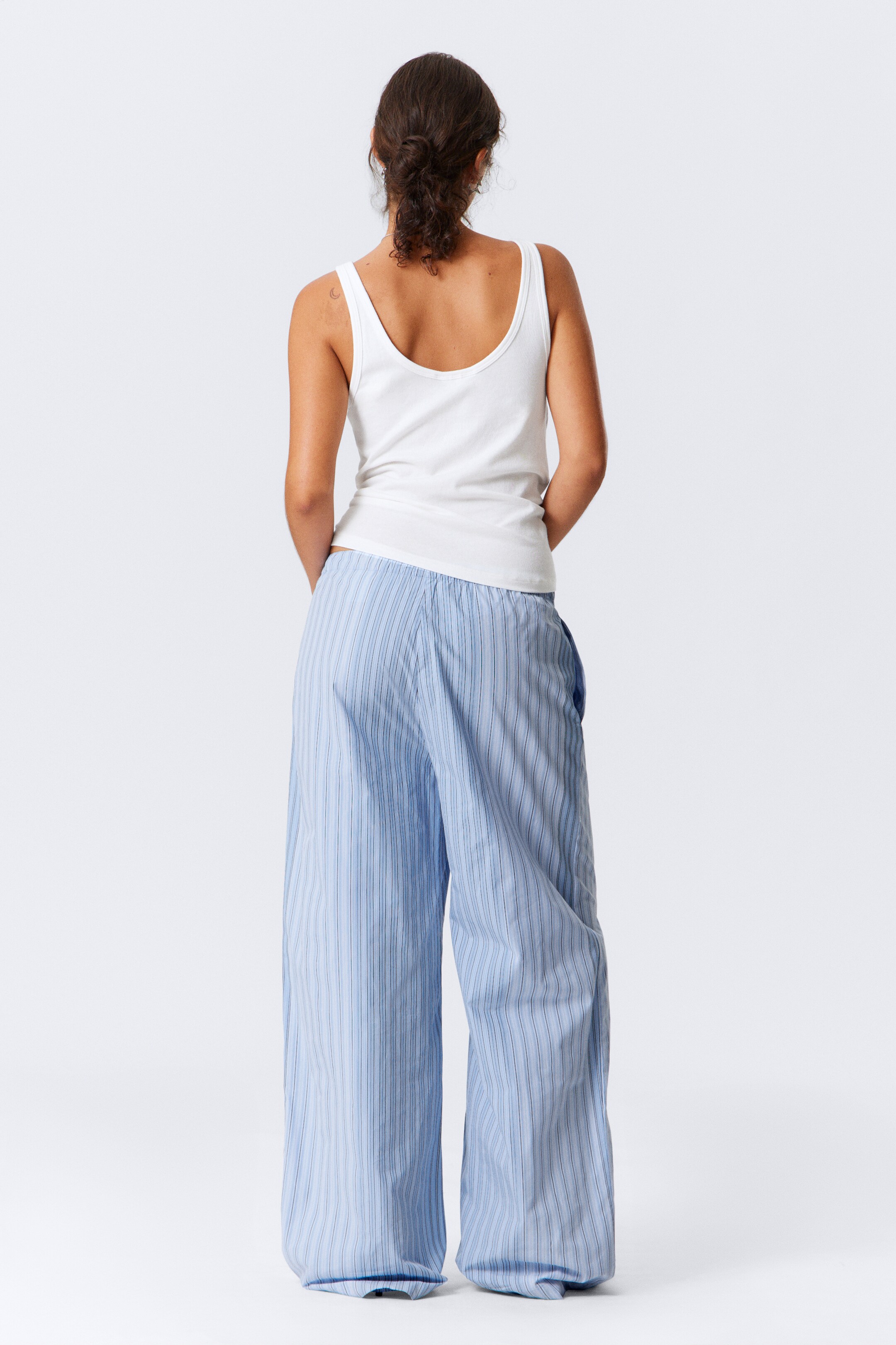 Visualizza immagine più grande: Pantaloni loose in cotone a vita bassa - Azzurro a righe - DONNA | H&M IT 3