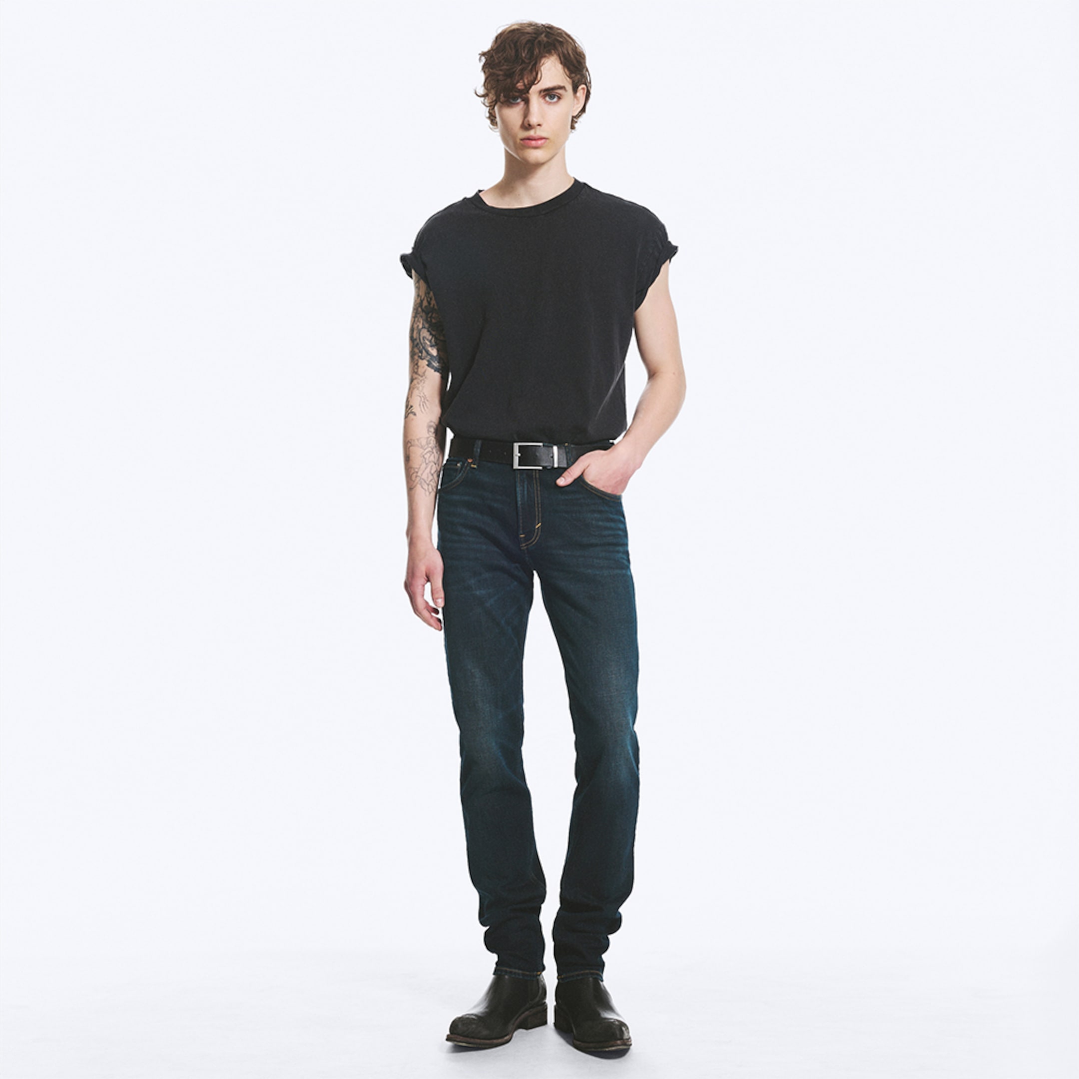 Model wearing a pair of slim fit jeans