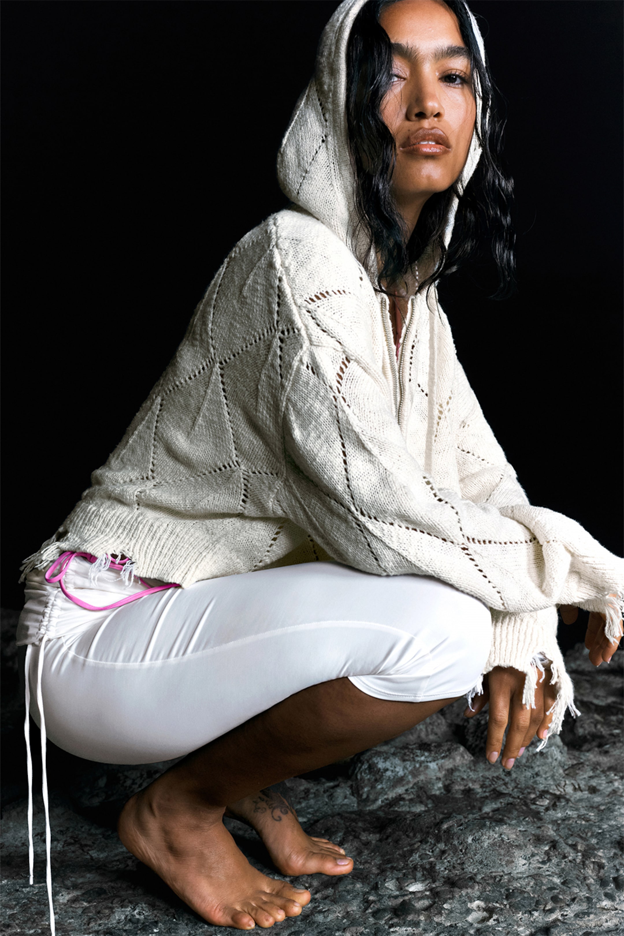 A girl wearing knitted crochet top