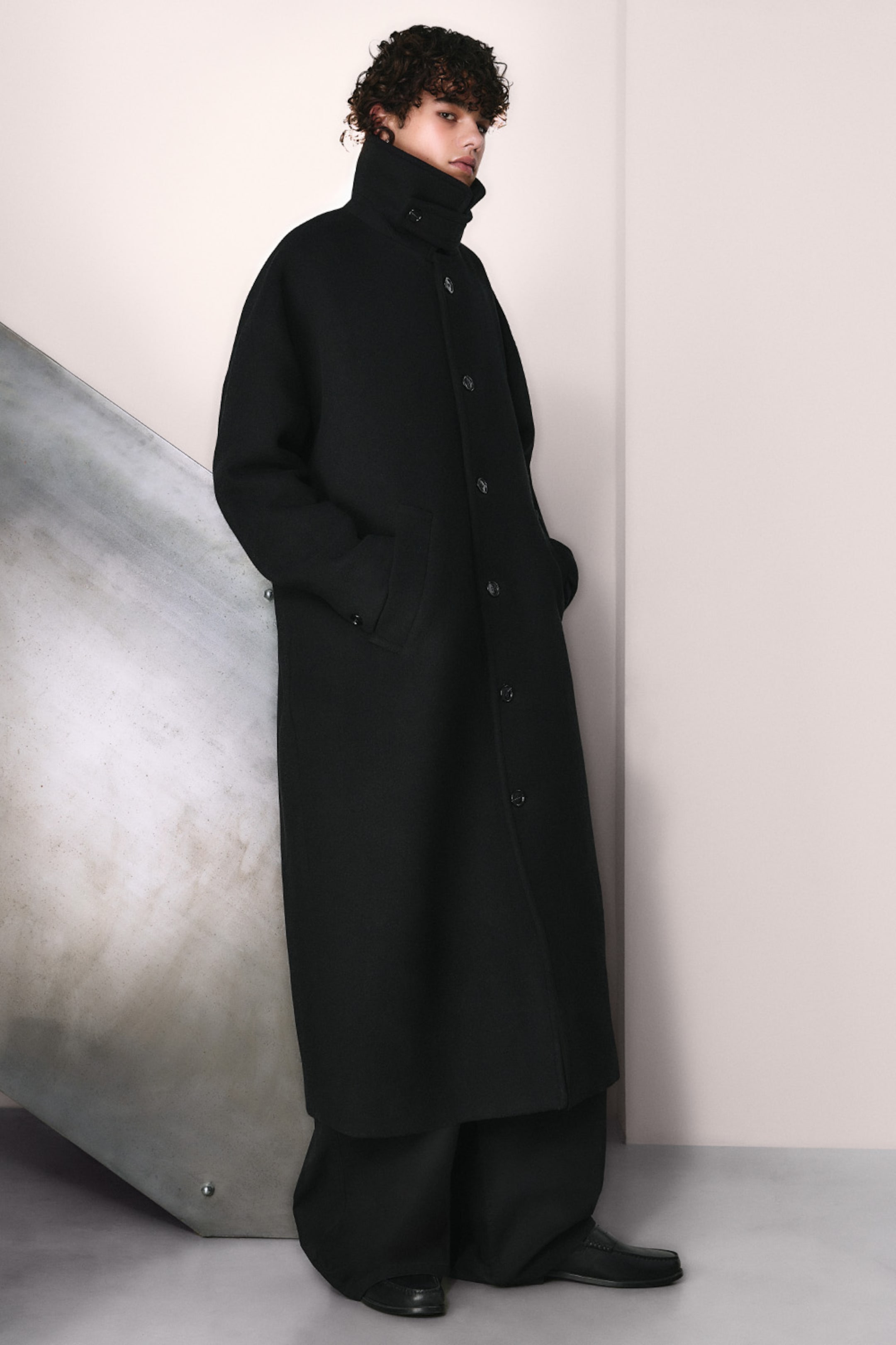 Model wearing part of the 2025 Weekday Premium Collection