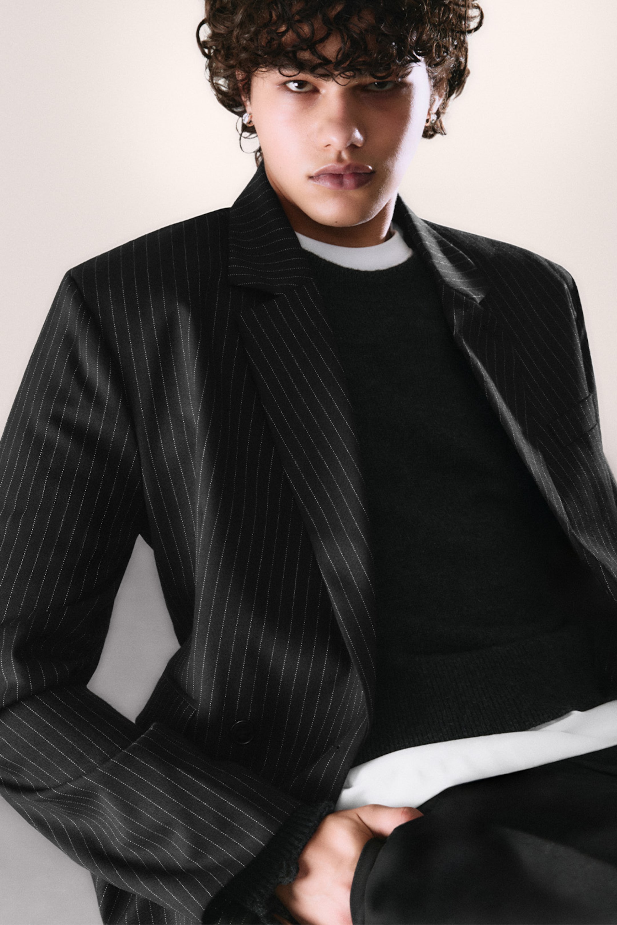 Model wearing part of the 2025 Weekday Premium Collection