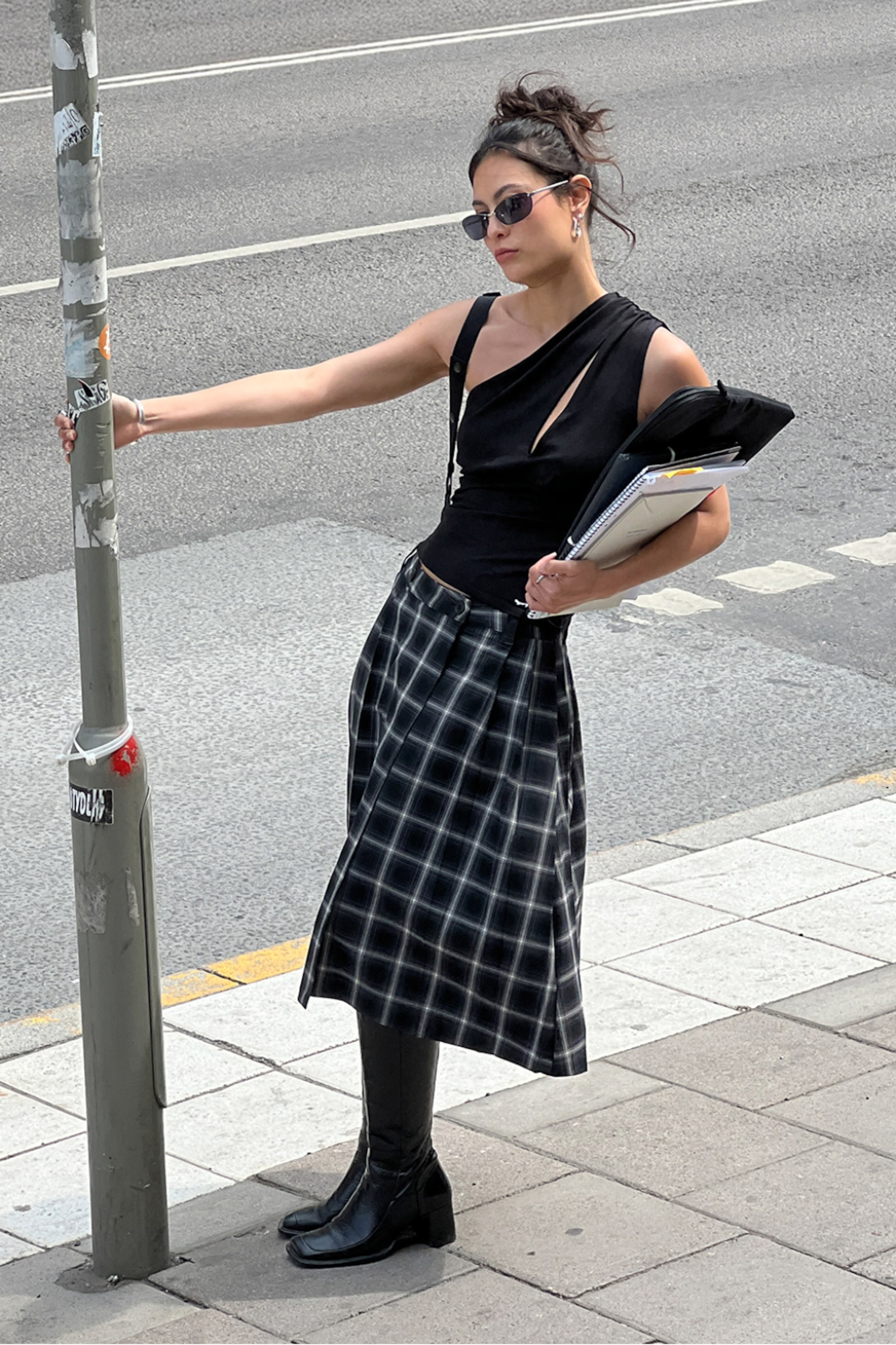 A woman wearing an outfit from Weekday Back to Reality collection